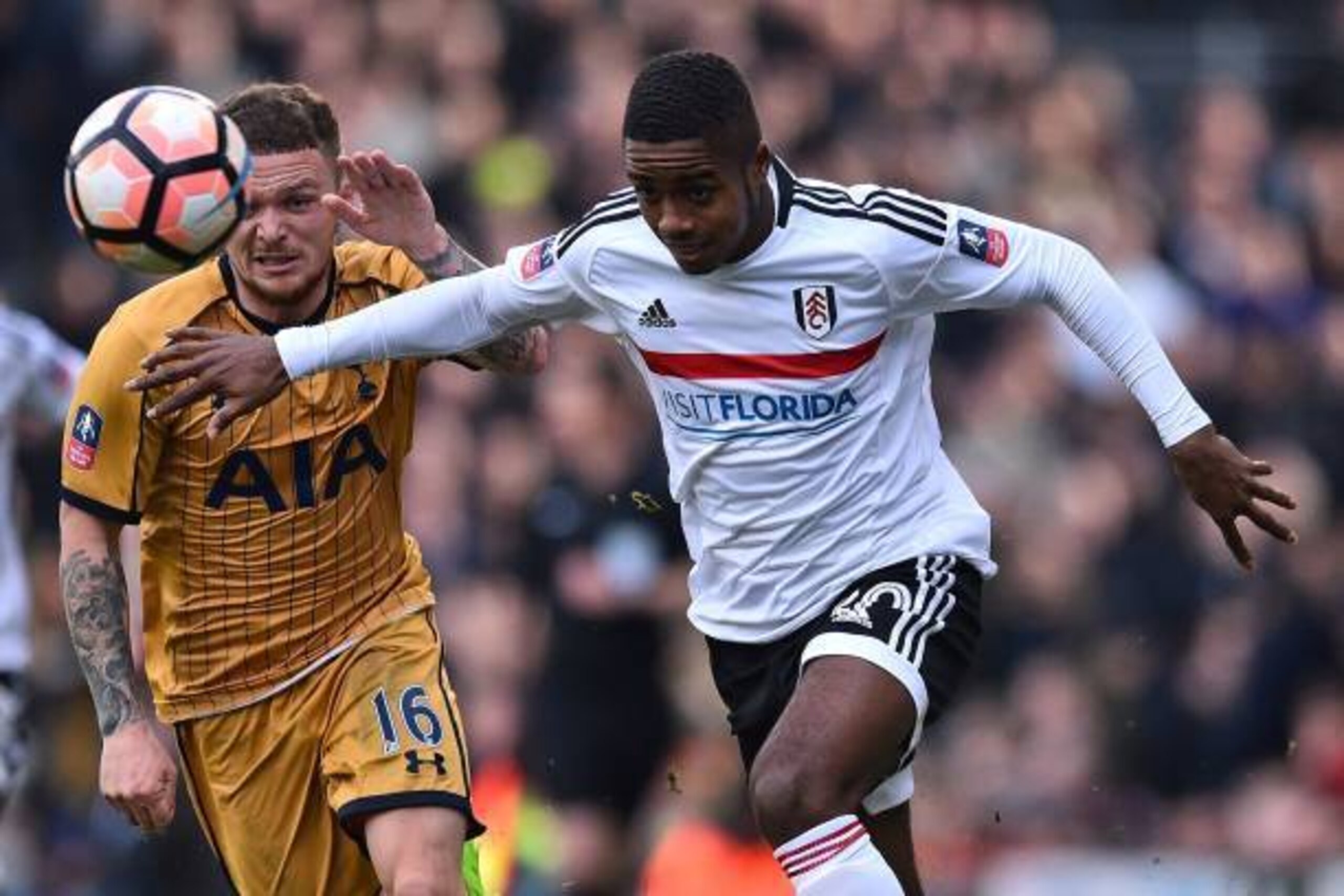 Tottenham Hotspur's English defender Kieran Trippier (L) vies with Fulham's English defender Ryan Sessegnon during the English FA Cup fifth round football match between Fulham and Tottenham Hotspur at Craven Cottage in London on February 19, 2017. / AFP /