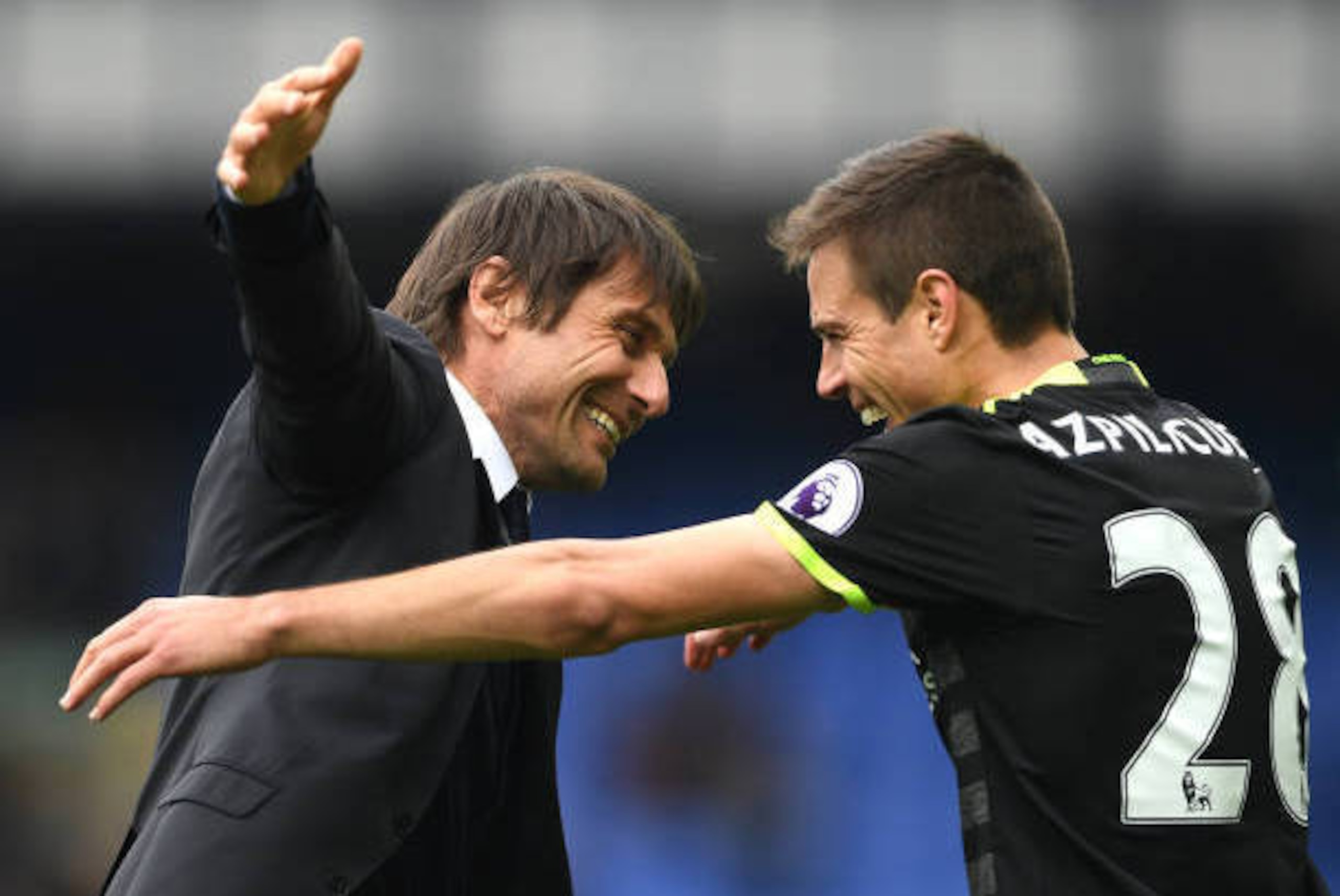 LIVERPOOL, ENGLAND - APRIL 30: Antonio Conte, Manager of Chelsea and Cesar Azpilicueta of Chelsea celebrate after the Premier League match between Everton and Chelsea at Goodison Park on April 30, 2017 in Liverpool, England.  (Photo by Laurence Griffiths/