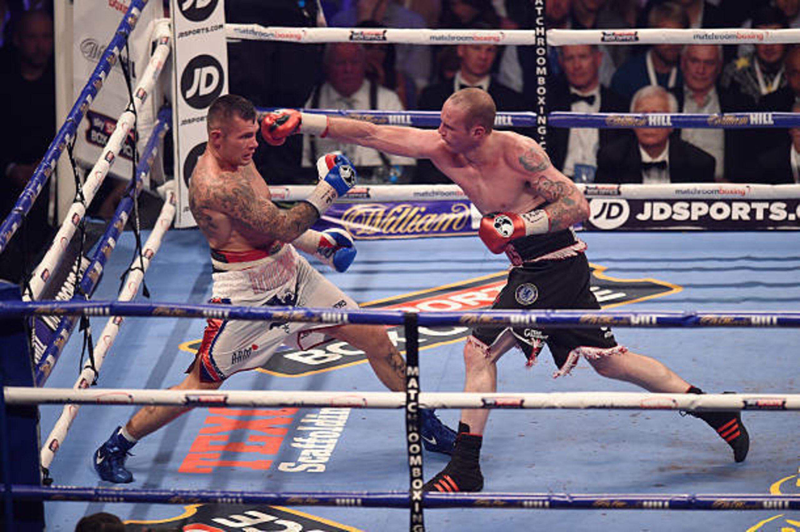 LONDON, ENGLAND - JUNE 25: George Groves attempts to throw a right hand punch on Martin Murray whilst boxing  for WBA International Super Middleweight title at The O2 Arena on June 25, 2016 in London, England. (Photo by Leigh Dawney/Getty Images)