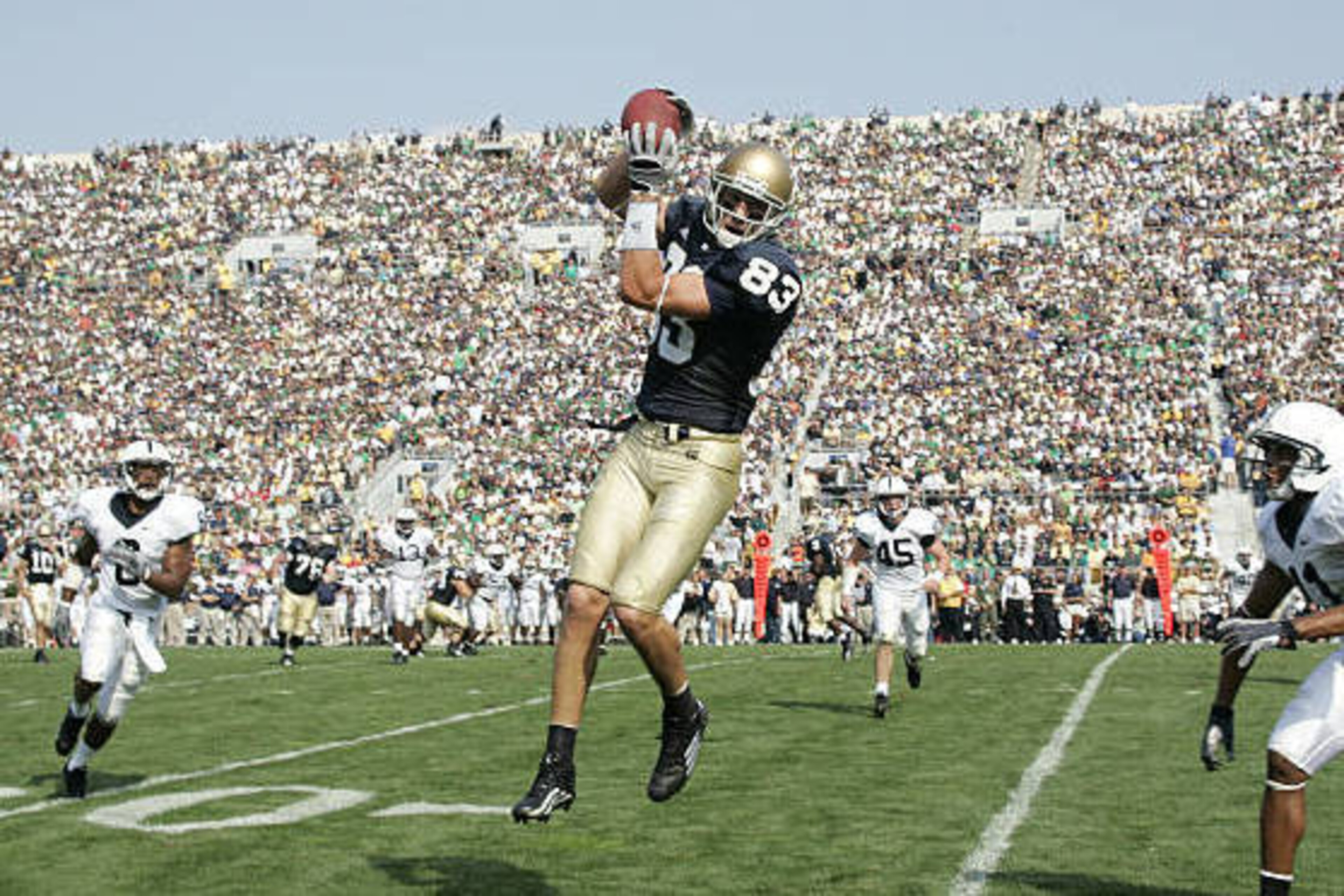 SOUTH BEND, IN - SEPTEMBER 9:  Jeff Samardzija #83 of the Notre Dame Fighting Irish makes a catch against the Penn State Nittany Lions at Notre Dame Stadium on September 9, 2006 in South Bend, Indiana. The Irish defeated the Nittany Lions 41-17. (Photo by