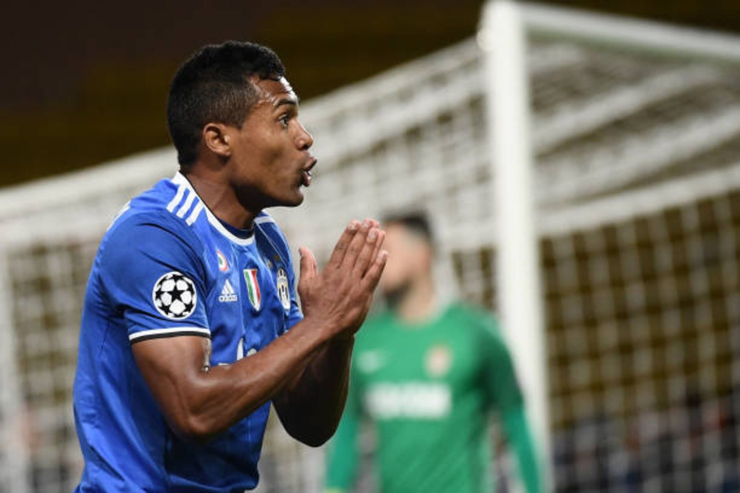 Juventus' defender from Brazil Alex Sandro reacts during the UEFA Champions League semi-final first leg football match Monaco vs Juventus at the Stade Louis II stadium in Monaco on May 3, 2017.  / AFP PHOTO / Anne-Christine POUJOULAT        (Photo credit 