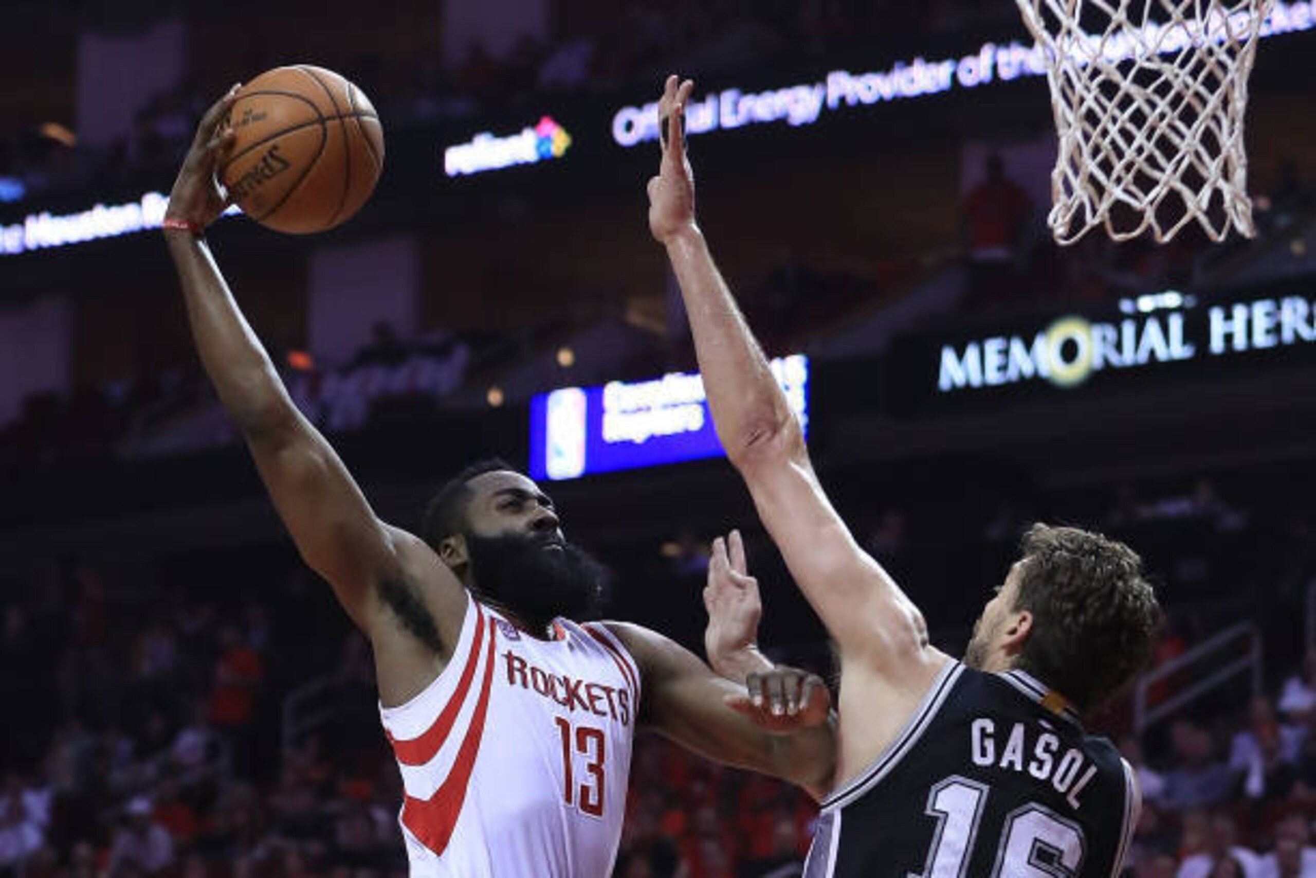 HOUSTON, TX - MAY 05:  James Harden #13 of the Houston Rockets dunks against Pau Gasol #16 of the San Antonio Spurs during Game Three of the NBA Western Conference Semi-Finals at Toyota Center on May 5, 2017 in Houston, Texas.  NOTE TO USER: User expressl