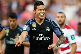 GRANADA, SPAIN - MAY 06:  James Rodriguez of Real Madrid CF celebrates after scoring the first goal during the La Liga match between Granada CF v Real Madrid CF at Estadio Nuevo Los Carmenes on May 6, 2017 in Granada, Spain.  (Photo by Aitor Alcalde/Getty