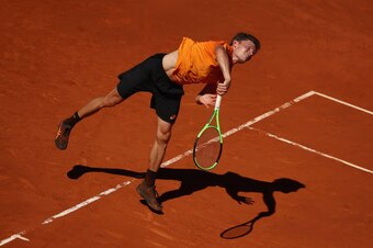 MADRID, SPAIN - MAY 07:  David Goffin of Belgium in action against Karen Khachanov of Russia during day two of the Mutua Madrid Open tennis at La Caja Magica on May 7, 2017 in Madrid, Spain.  (Photo by Julian Finney/Getty Images)