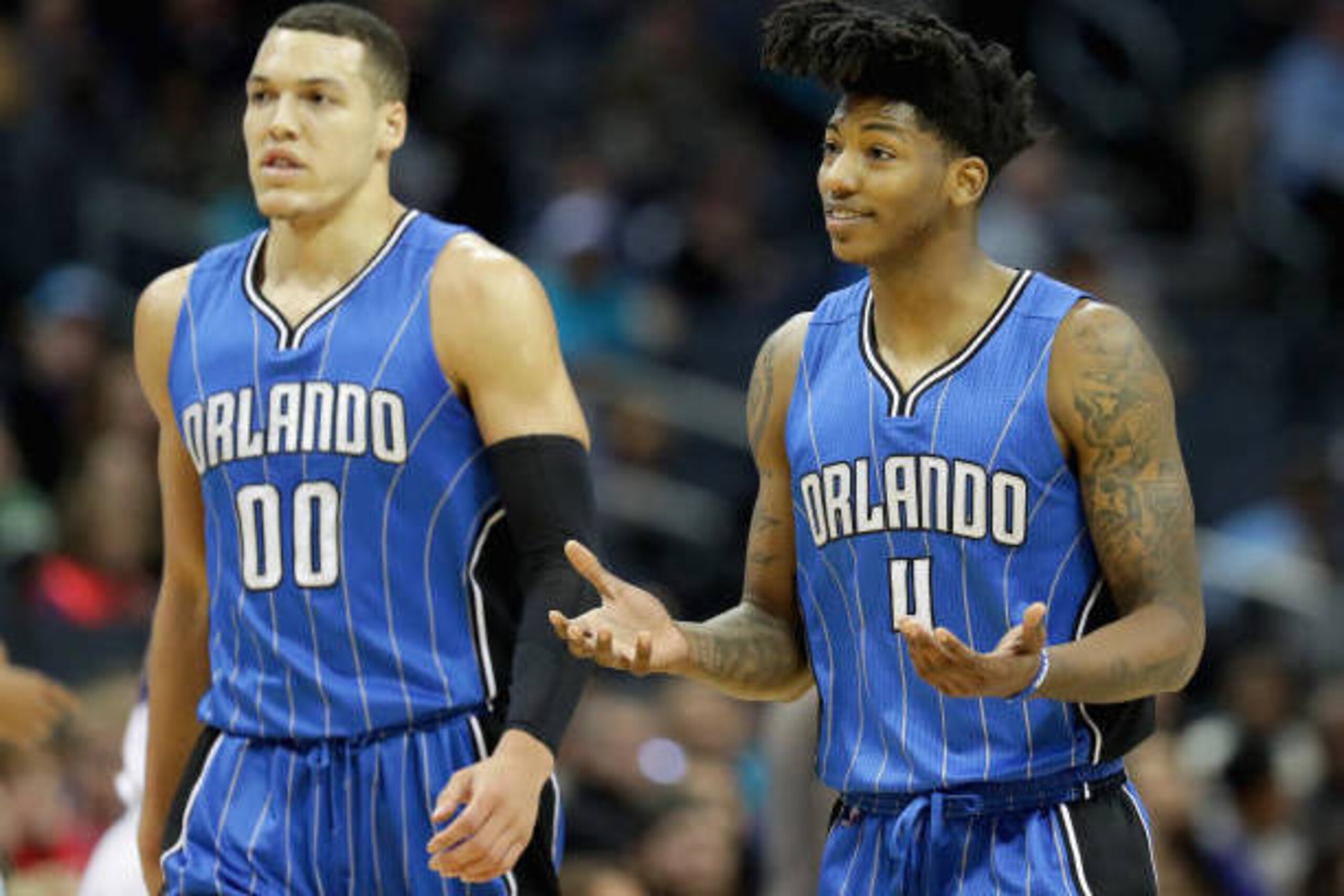 CHARLOTTE, NC - MARCH 10:  Teammates Aaron Gordon #00 and Elfrid Payton #4 of the Orlando Magic react after a call during their game against the Charlotte Hornets at Spectrum Center on March 10, 2017 in Charlotte, North Carolina. NOTE TO USER: User expres