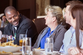 Bennett sits down and speak with fans while on a tour of the Hinterland Brewery in Green Bay.