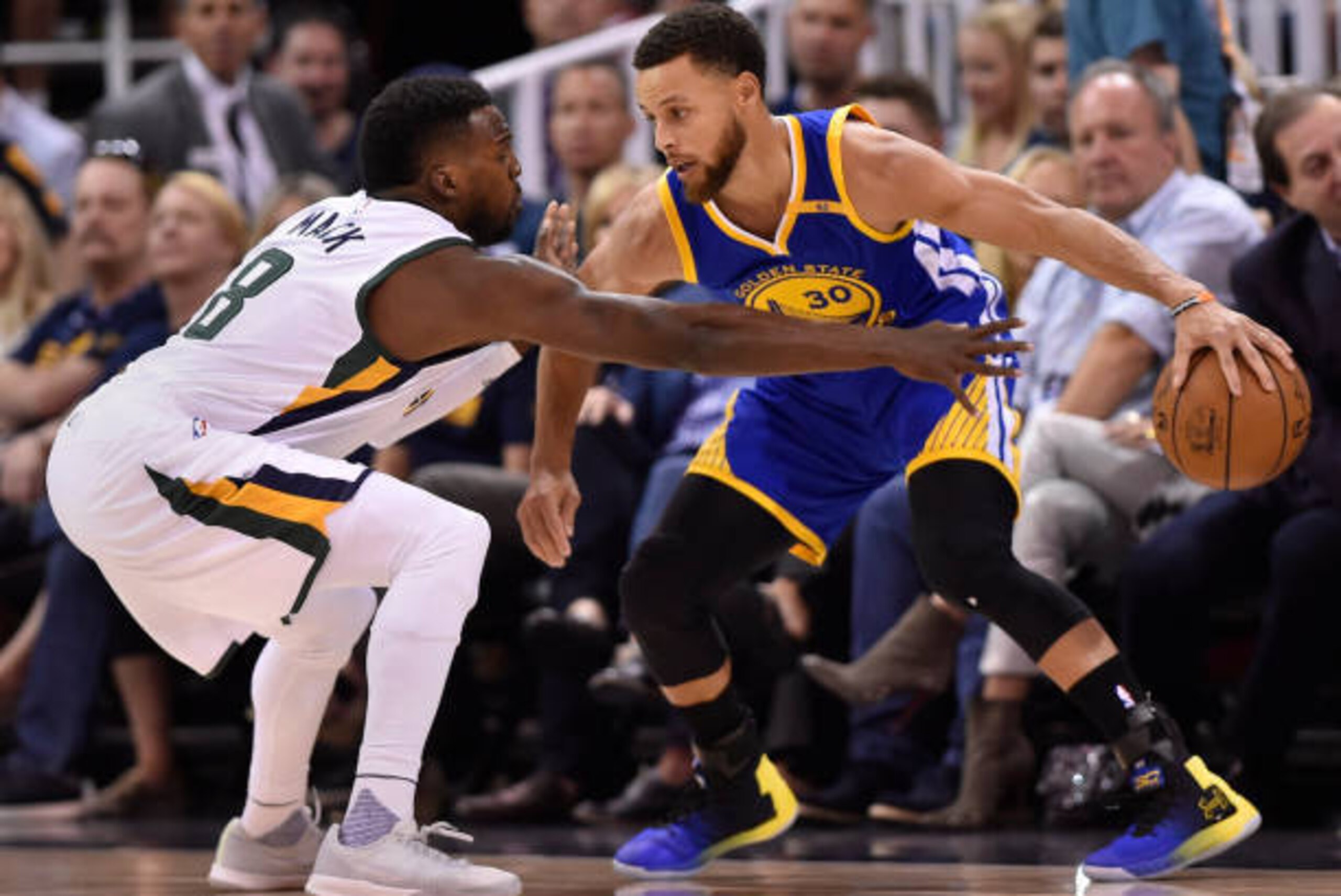 SALT LAKE CITY, UT - MAY 6: Shelvin Mack #8 of the Utah Jazz defends against Stephen Curry #30 of the Golden State Warriors in the first half in Game Three of the Western Conference Semifinals during the 2017 NBA Playoffs at Vivint Smart Home Arena on May