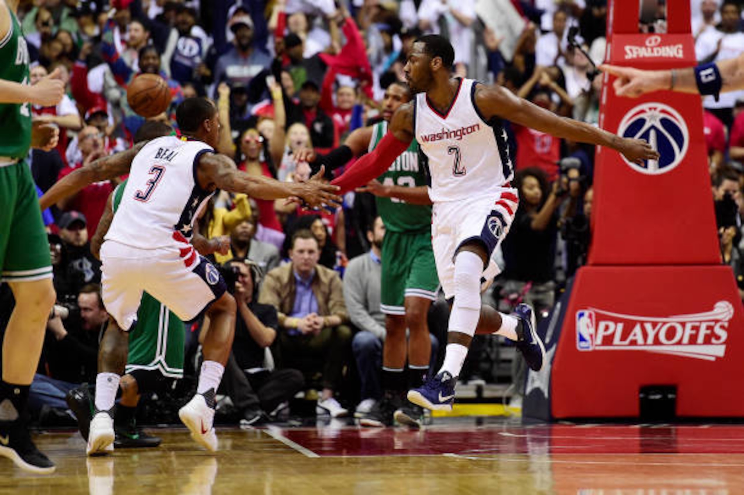 WASHINGTON, DC - MAY 07: John Wall #2 and Bradley Beal #3 of the Washington Wizards celebrate after a basket in the second half against the Boston Celtics in Game Four of the Eastern Conference Semifinals at Verizon Center on May 7, 2017 in Washington, DC WASHINGTON, DC - MAY 07: John Wall #2 and Bradley Beal #3 of the Washington Wizards celebrate after a basket in the second half against the Boston Celtics in Game Four of the Eastern Conference Semifinals at Verizon Center on May 7, 2017 in Washington, DC