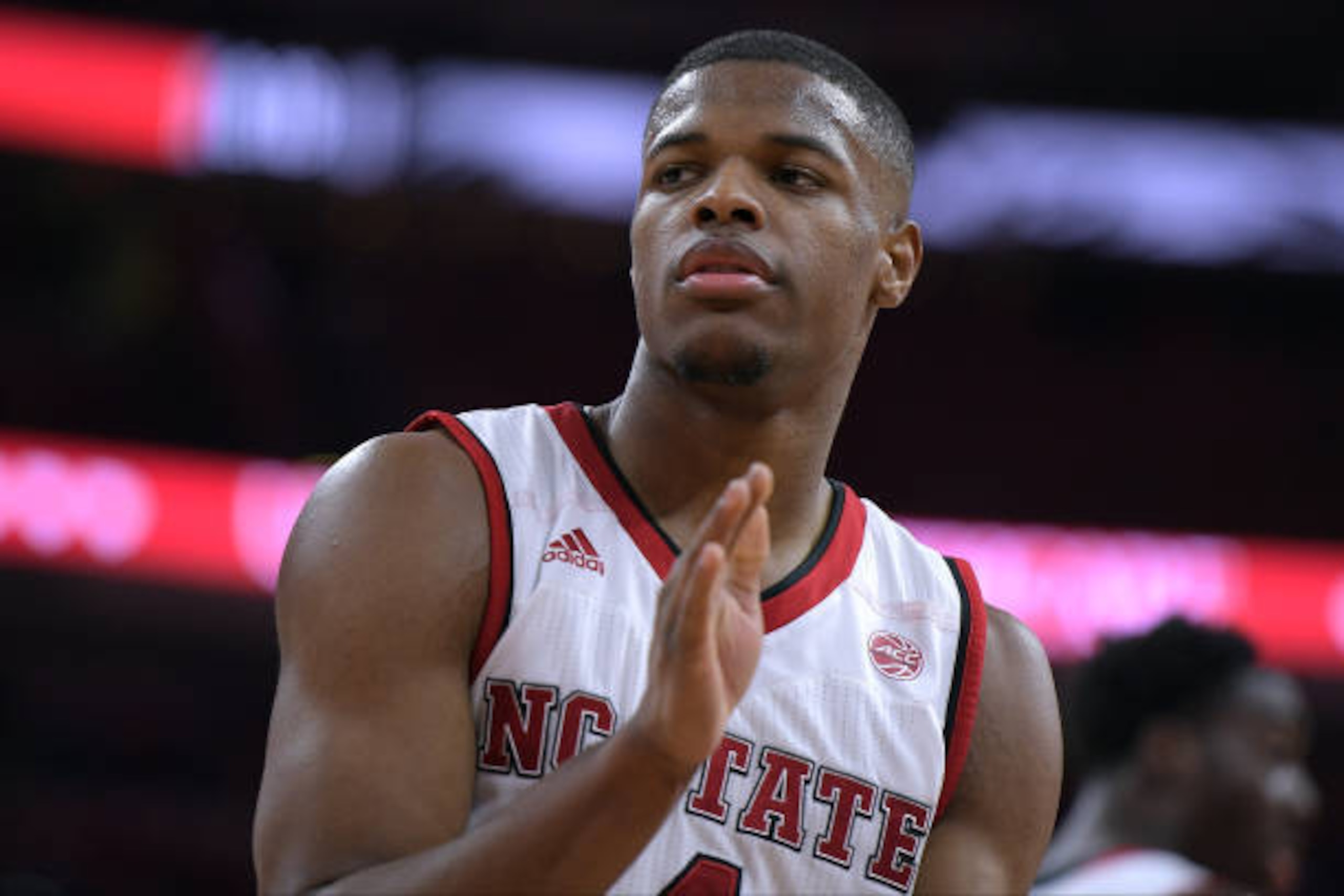 RALEIGH, NC - FEBRUARY 01: Dennis Smith Jr. #4 of the North Carolina State Wolfpack reacts against the Syracuse Orange at PNC Arena on February 1, 2017 in Raleigh, North Carolina. (Photo by Lance King/Getty Images)