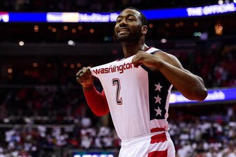 WASHINGTON, DC - MAY 07: John Wall #2 of the Washington Wizards celebrates in the third quarter against the Boston Celtics in Game Four of the Eastern Conference Semifinals at Verizon Center on May 7, 2017 in Washington, DC. NOTE TO USER: User expressly a