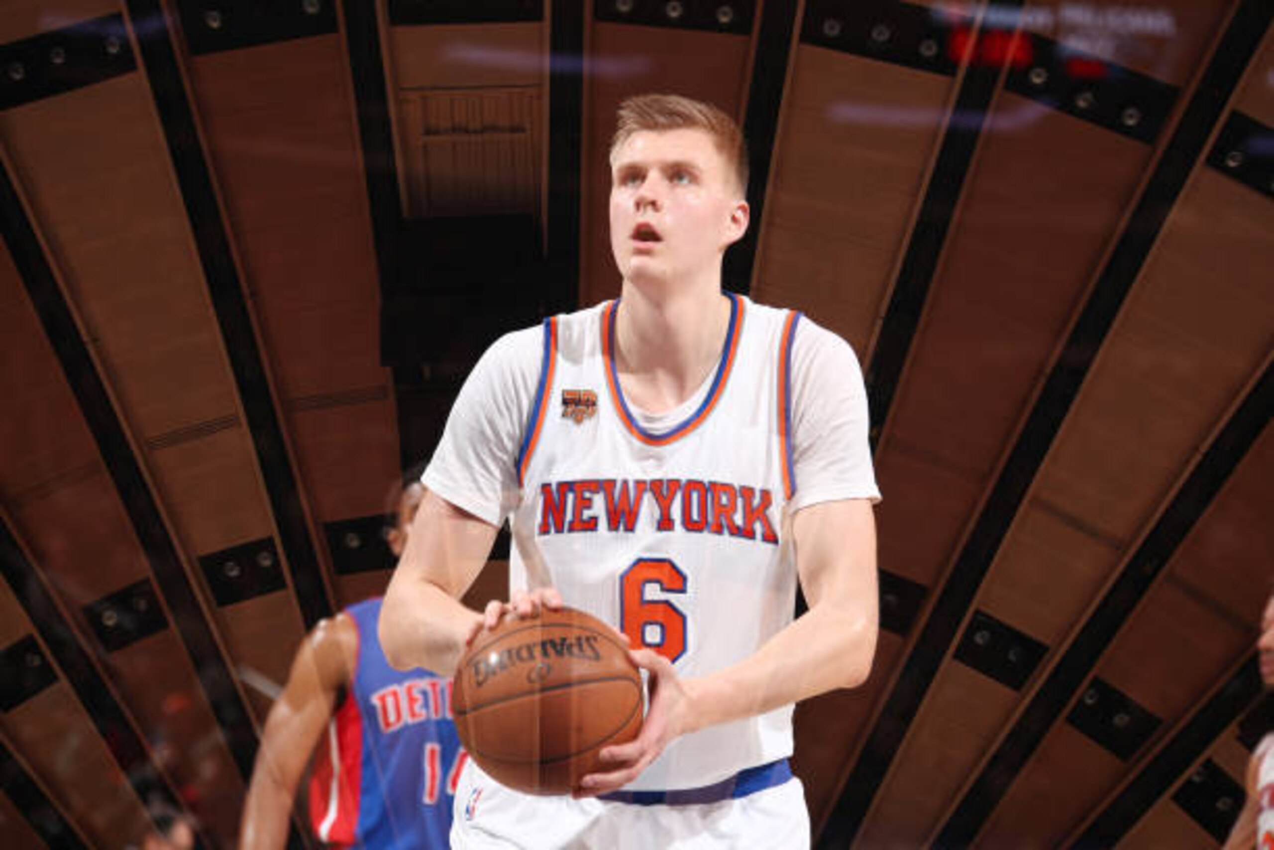 NEW YORK, NY - MARCH 27: (EDITORS NOTE: Multiple exposures were combined in camera to produce this image.) Kristaps Porzingis #6 of the New York Knicks shoots the ball during a game against the Detroit Pistons on March 27, 2017 at Madison Square Garden i NEW YORK, NY - MARCH 27: (EDITORS NOTE: Multiple exposures were combined in camera to produce this image.) Kristaps Porzingis #6 of the New York Knicks shoots the ball during a game against the Detroit Pistons on March 27, 2017 at Madison Square Garden i