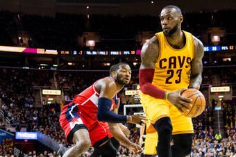 CLEVELAND, OH - MARCH 25: John Wall #2 of the Washington Wizards puts pressure on LeBron James #23 of the Cleveland Cavaliers during the second half at Quicken Loans Arena on March 25, 2017 in Cleveland, Ohio. The Wizards defeated the Cavaliers 127-115. N