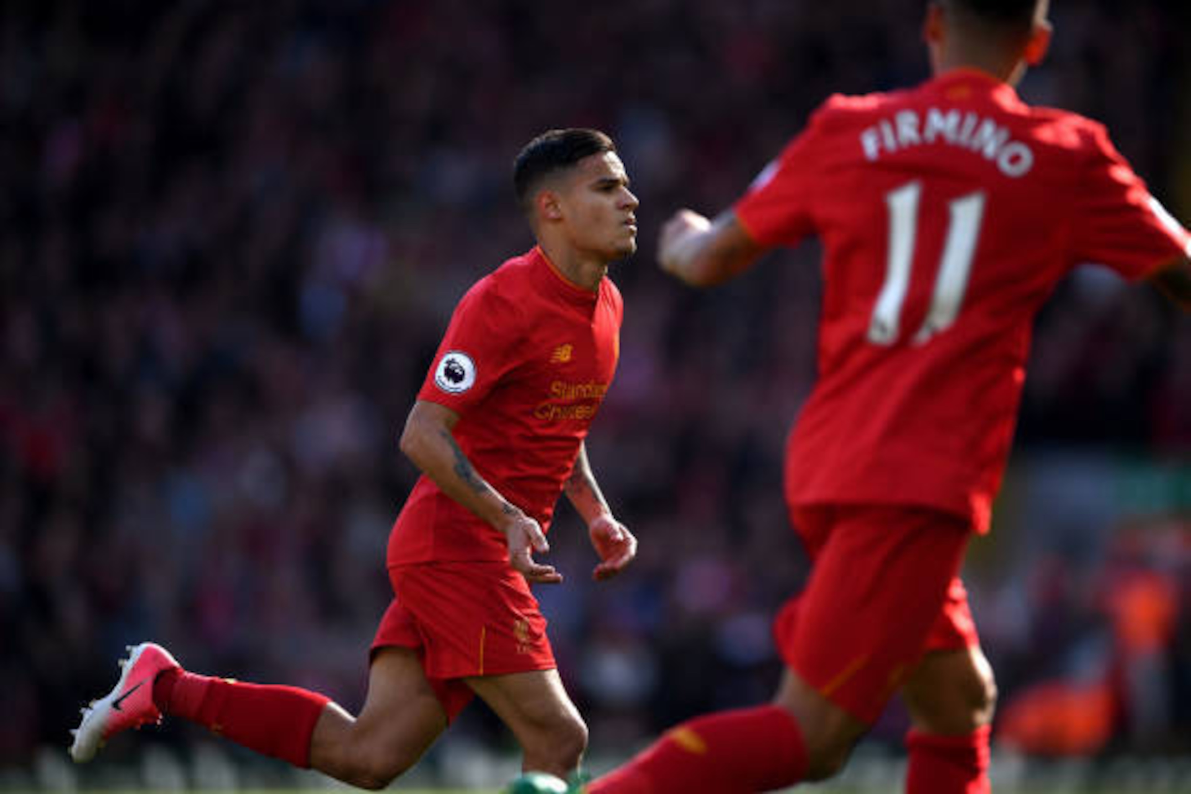 LIVERPOOL, ENGLAND - APRIL 23:  Philippe Coutinho of Liverpool celebrates scoring the opening goal from a free kick during the Premier League match between Liverpool and Crystal Palace at Anfield on April 23, 2017 in Liverpool, England.  (Photo by Laurenc