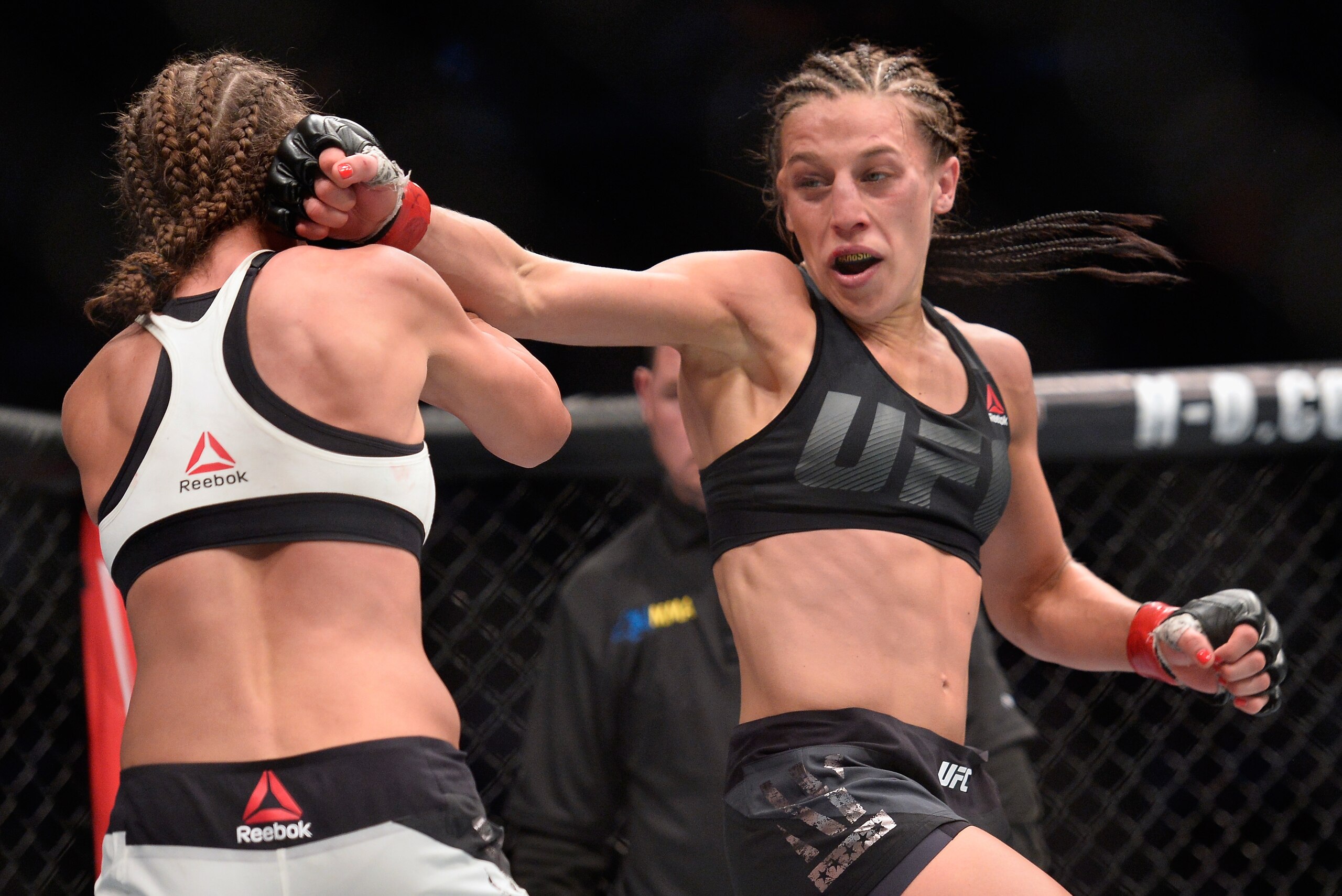 NEW YORK, NY - NOVEMBER 12:  Karolina Kowalkiewicz of Poland (left) fights against Joanna Jedrzejczyk of Poland in their women's strawweight championship bout during the UFC 205 event at Madison Square Garden on November 12, 2016 in New York City.  (Photo