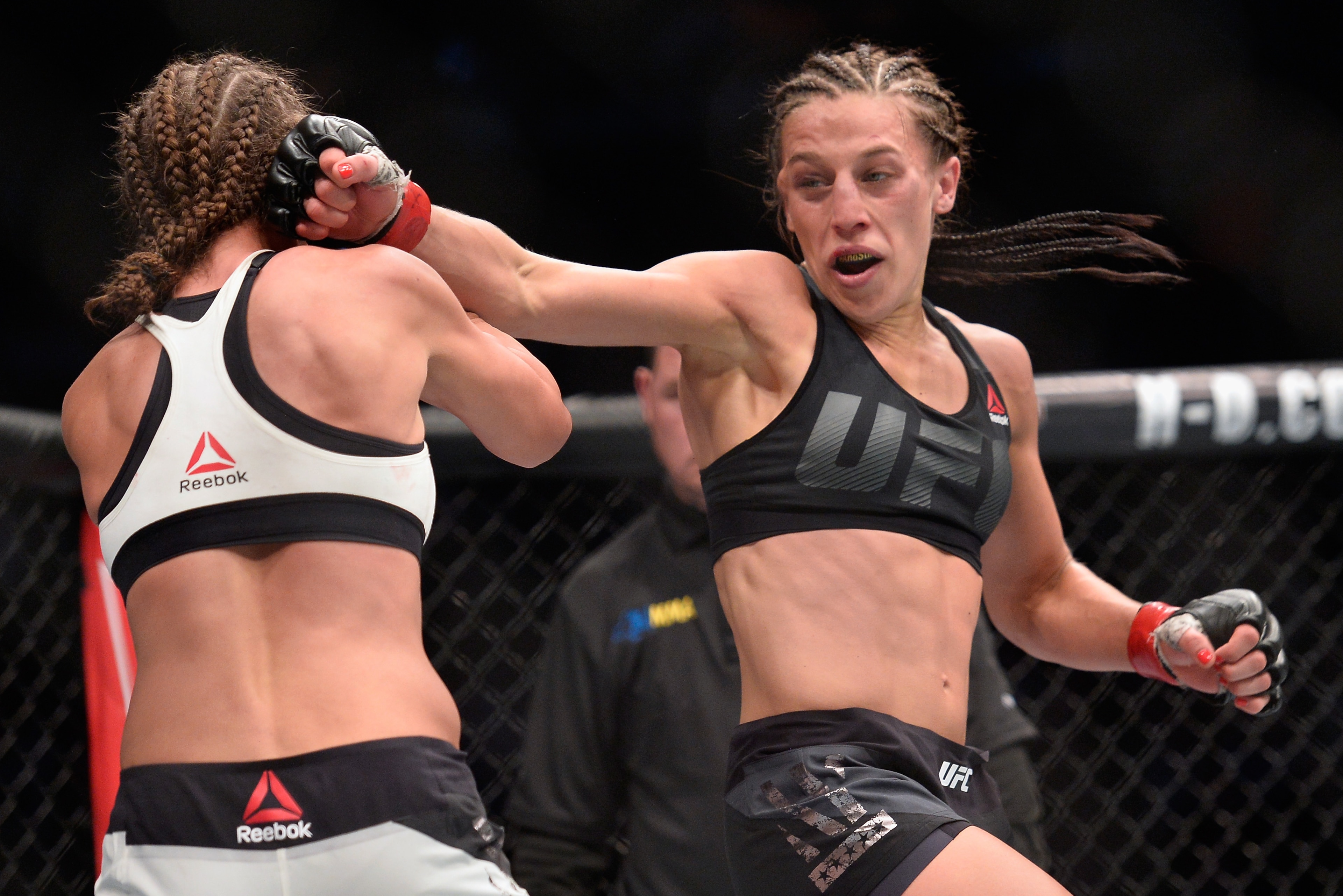 NEW YORK, NY - NOVEMBER 12:  Karolina Kowalkiewicz of Poland (left) fights against Joanna Jedrzejczyk of Poland in their women's strawweight championship bout during the UFC 205 event at Madison Square Garden on November 12, 2016 in New York City.  (Photo