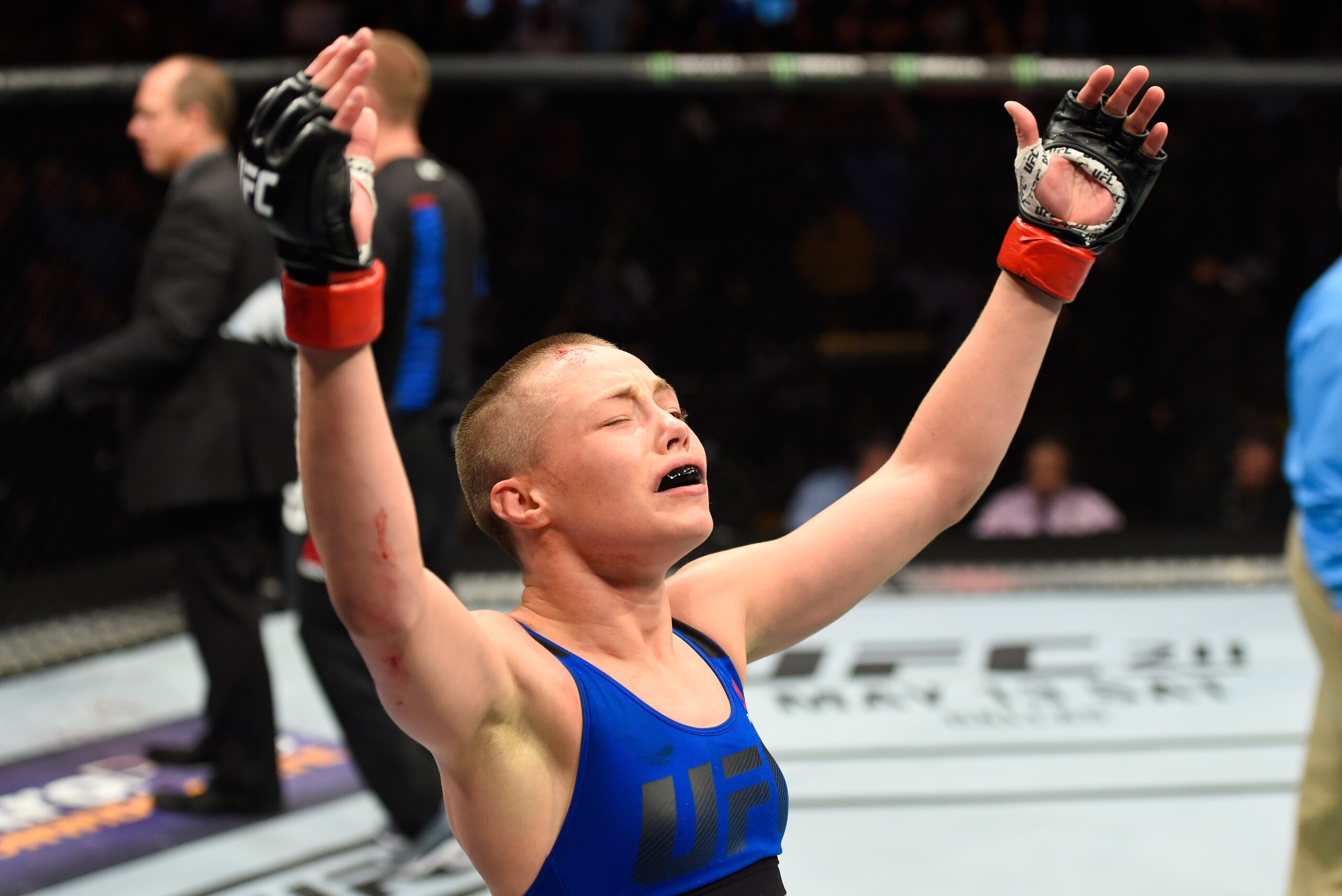 KANSAS CITY, MO - APRIL 15:  Rose Namajunas celebrates her submission victory over Michelle Waterson in their women's strawweight fight during the UFC Fight Night event at Sprint Center on April 15, 2017 in Kansas City, Missouri. (Photo by Josh Hedges/Zuf