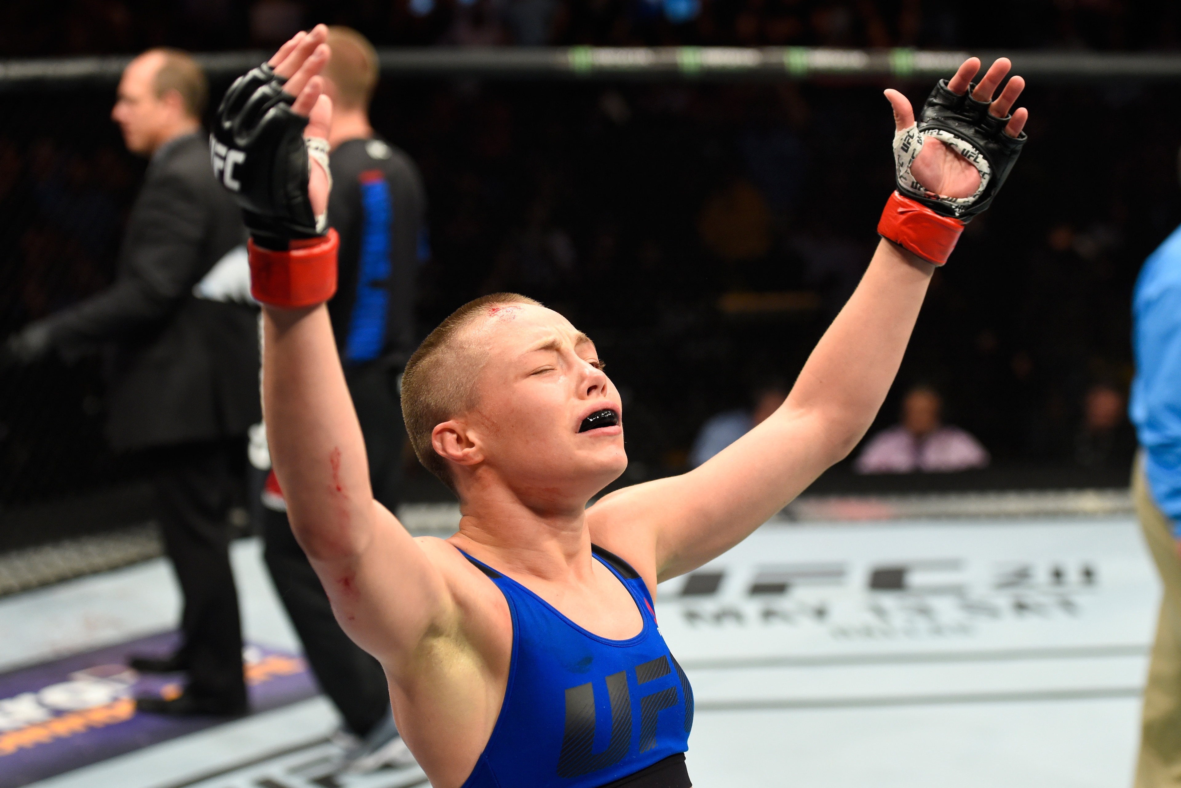 KANSAS CITY, MO - APRIL 15:  Rose Namajunas celebrates her submission victory over Michelle Waterson in their women's strawweight fight during the UFC Fight Night event at Sprint Center on April 15, 2017 in Kansas City, Missouri. (Photo by Josh Hedges/Zuf