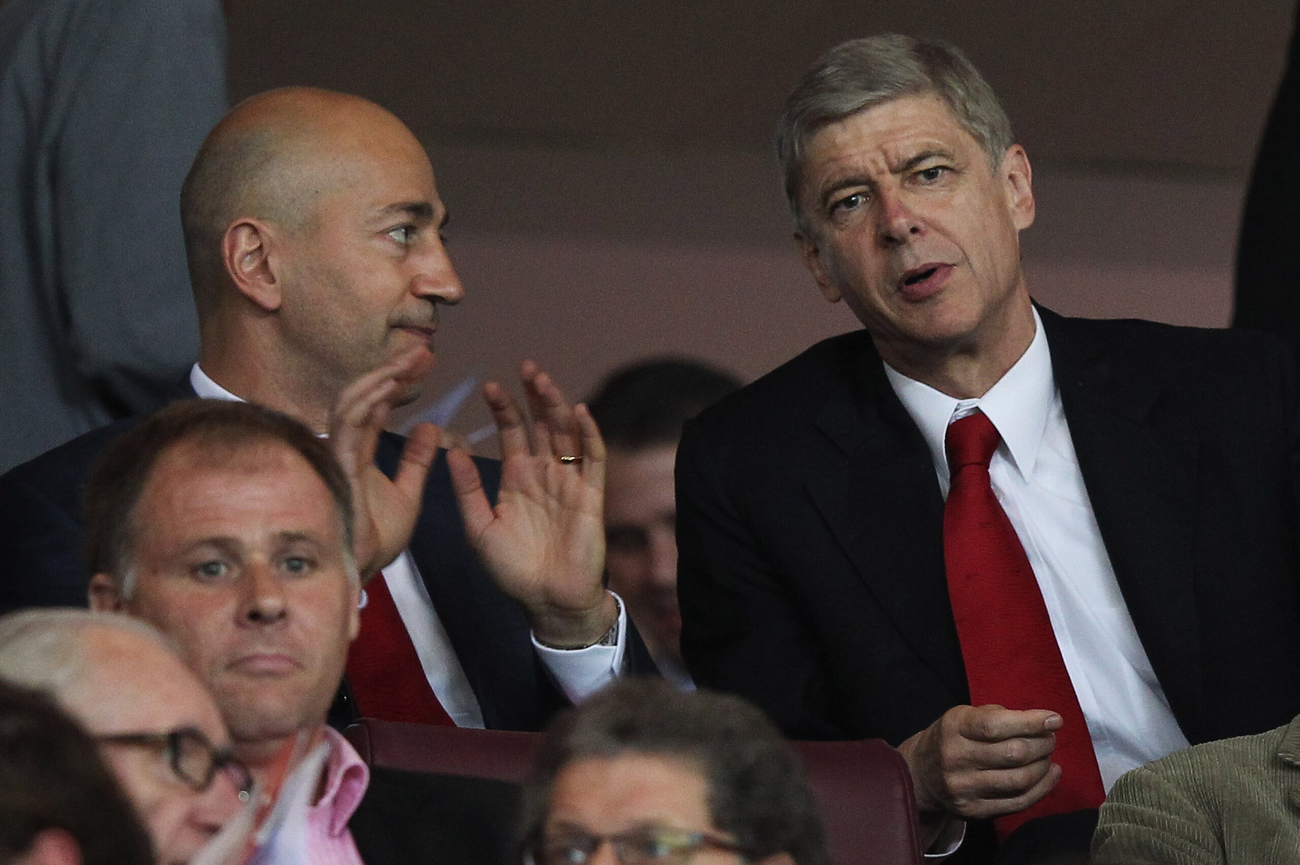 LONDON, ENGLAND - SEPTEMBER 28: Arsene Wenger manager of Arsenal (R) and Ivan Gazidis, CEO of Arsenal (L) in discussion as they sit in the stands prior to the UEFA Champions League Group F match between Arsenal and Olympiacos at the Emirates Stadium on S LONDON, ENGLAND - SEPTEMBER 28: Arsene Wenger manager of Arsenal (R) and Ivan Gazidis, CEO of Arsenal (L) in discussion as they sit in the stands prior to the UEFA Champions League Group F match between Arsenal and Olympiacos at the Emirates Stadium on S