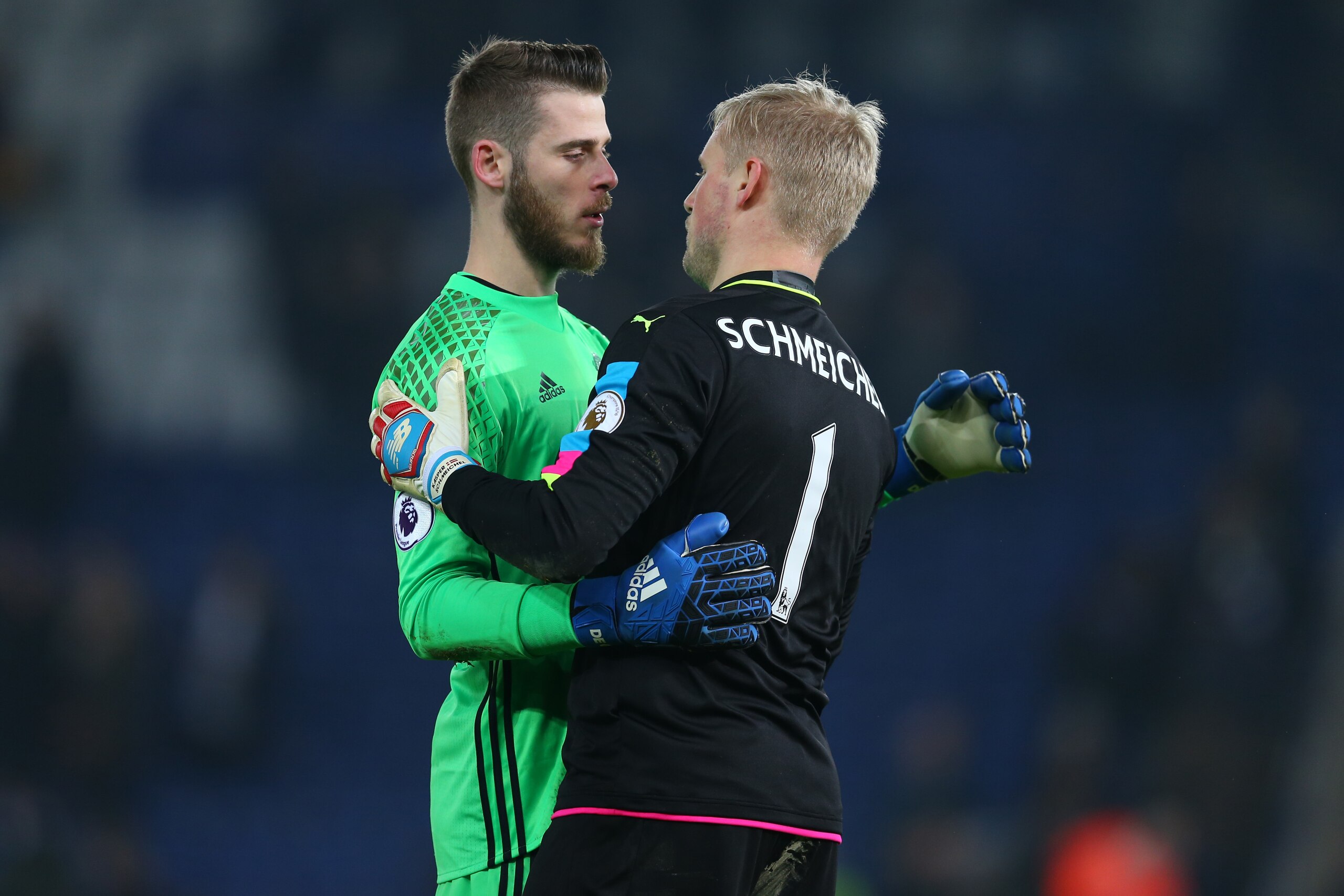 LEICESTER, ENGLAND - FEBRUARY 05: Manchester United goalkeeper David de Gea hugs Leicester City goalkeeper Kasper Schmeichel after the Premier League match between Leicester City and Manchester United at The King Power Stadium on February 5, 2017 in Leice