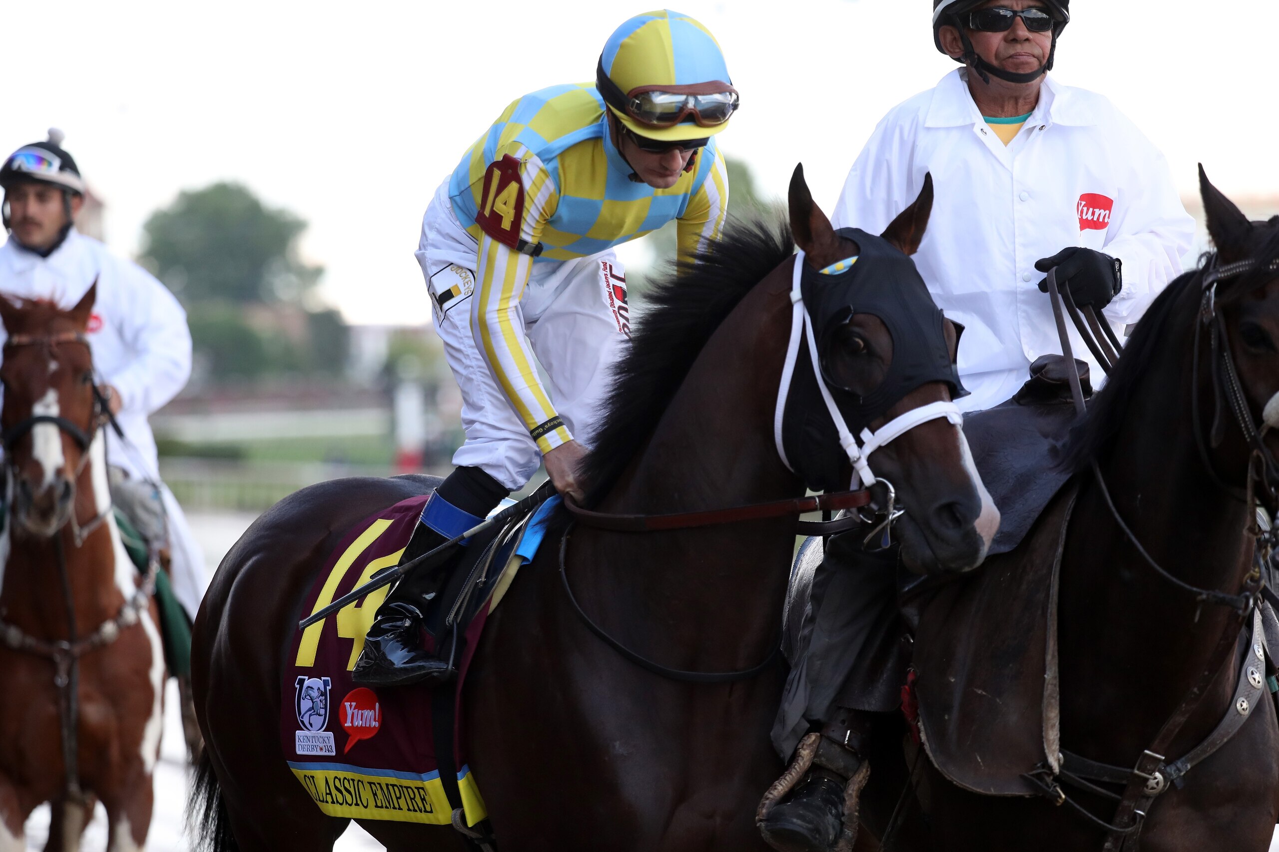 LOUISVILLE, KY - MAY 06:  Classic Empire #14, ridden by jockey Julien Leparoux, trots on track in the post parade prior to the start of the 143rd running of the Kentucky Derby at Churchill Downs on May 6, 2017 in Louisville, Kentucky.  (Photo by Rob Carr/