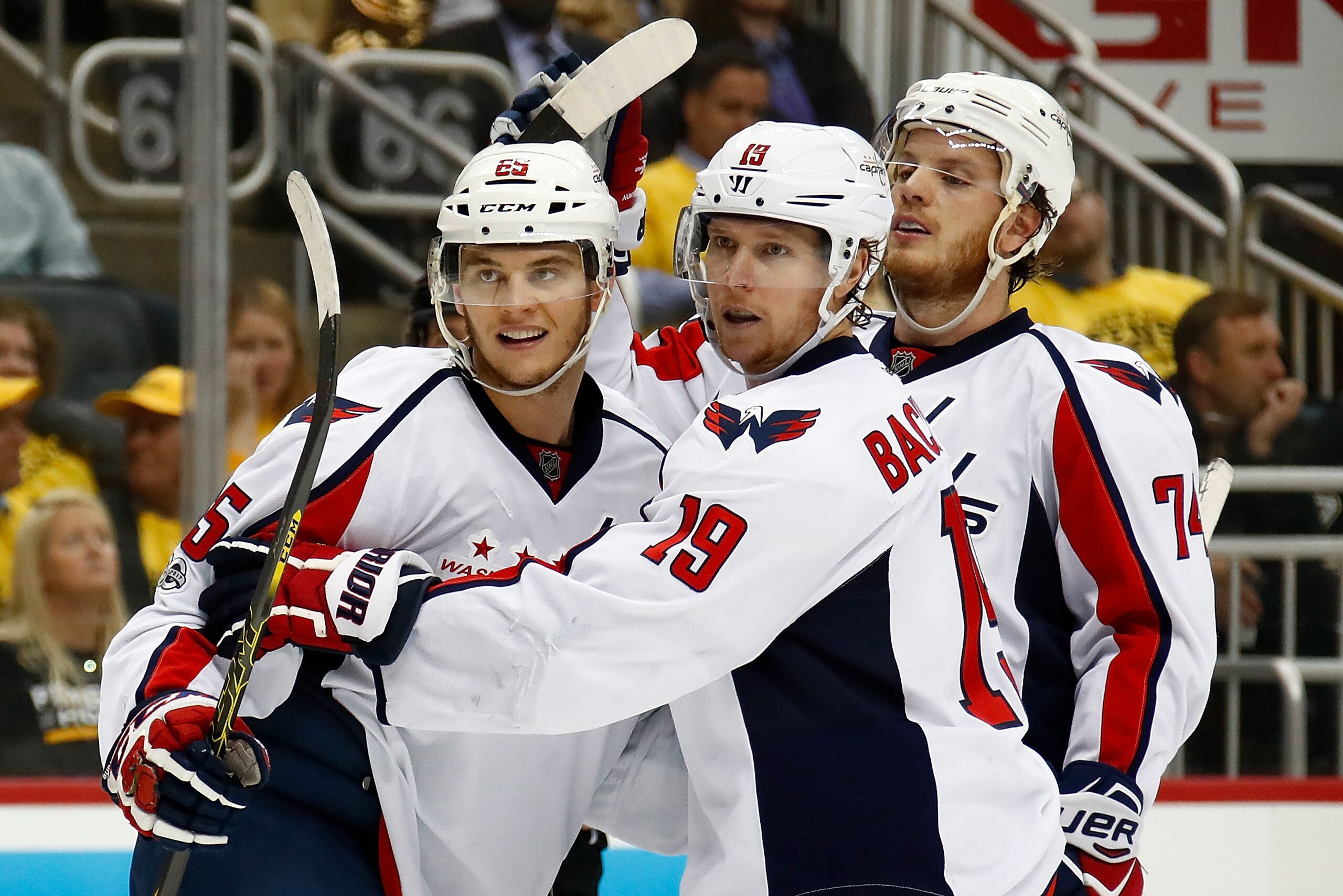 PITTSBURGH, PA - MAY 08: Andre Burakovsky #65 of the Washington Capitals reacts after scoring a goal against the Pittsburgh Penguins with Nicklas Backstrom #19 and John Carlson #74 in Game Six of the Eastern Conference Second Round during the 2017 NHL St PITTSBURGH, PA - MAY 08: Andre Burakovsky #65 of the Washington Capitals reacts after scoring a goal against the Pittsburgh Penguins with Nicklas Backstrom #19 and John Carlson #74 in Game Six of the Eastern Conference Second Round during the 2017 NHL St