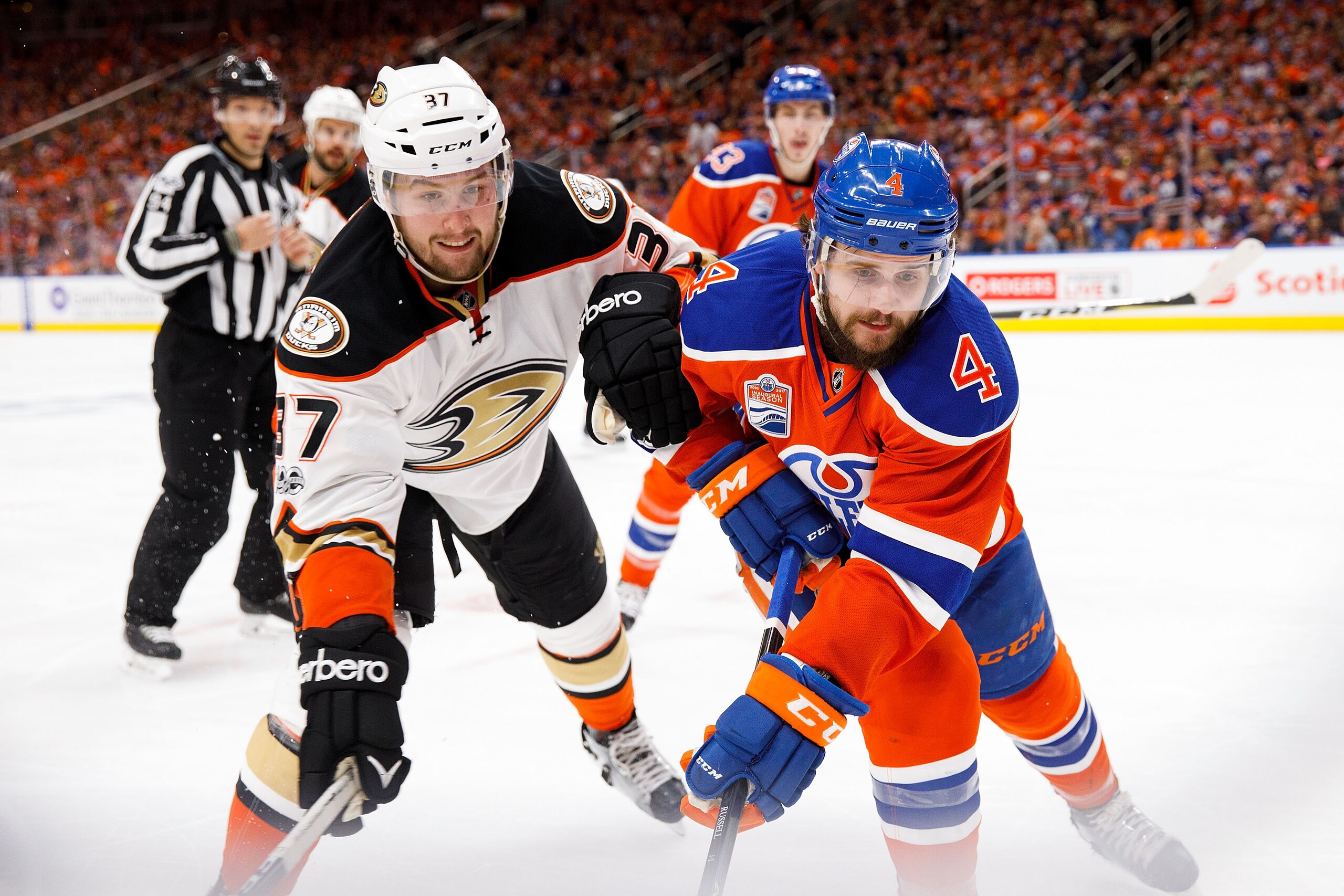 EDMONTON, AB - MAY 7: Kris Russell #4 of the Edmonton Oilers battles against Nick Ritchie #37 of the Anaheim Ducks in Game Six of the Western Conference Second Round during the 2017 NHL Stanley Cup Playoffs at Rogers Place on May 7, 2017 in Edmonton, Alb EDMONTON, AB - MAY 7: Kris Russell #4 of the Edmonton Oilers battles against Nick Ritchie #37 of the Anaheim Ducks in Game Six of the Western Conference Second Round during the 2017 NHL Stanley Cup Playoffs at Rogers Place on May 7, 2017 in Edmonton, Alb