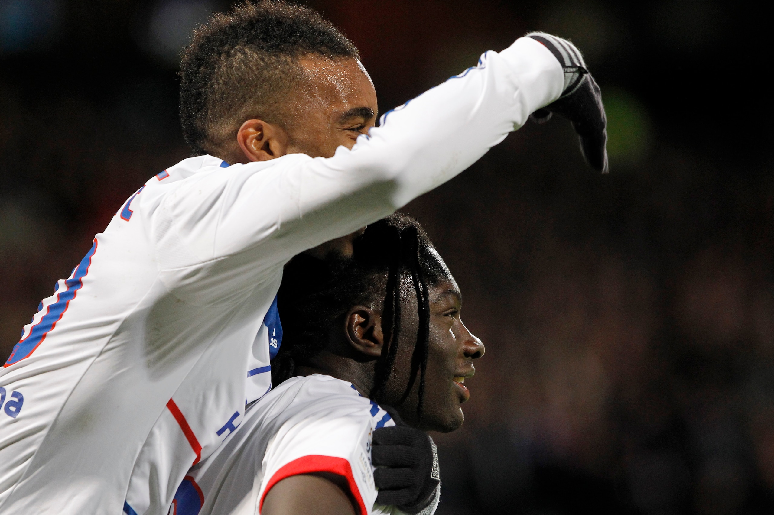 Lacazette's first steps as central striker for Lyon were alongside Bafetimbi Gomis in a 4-4-2