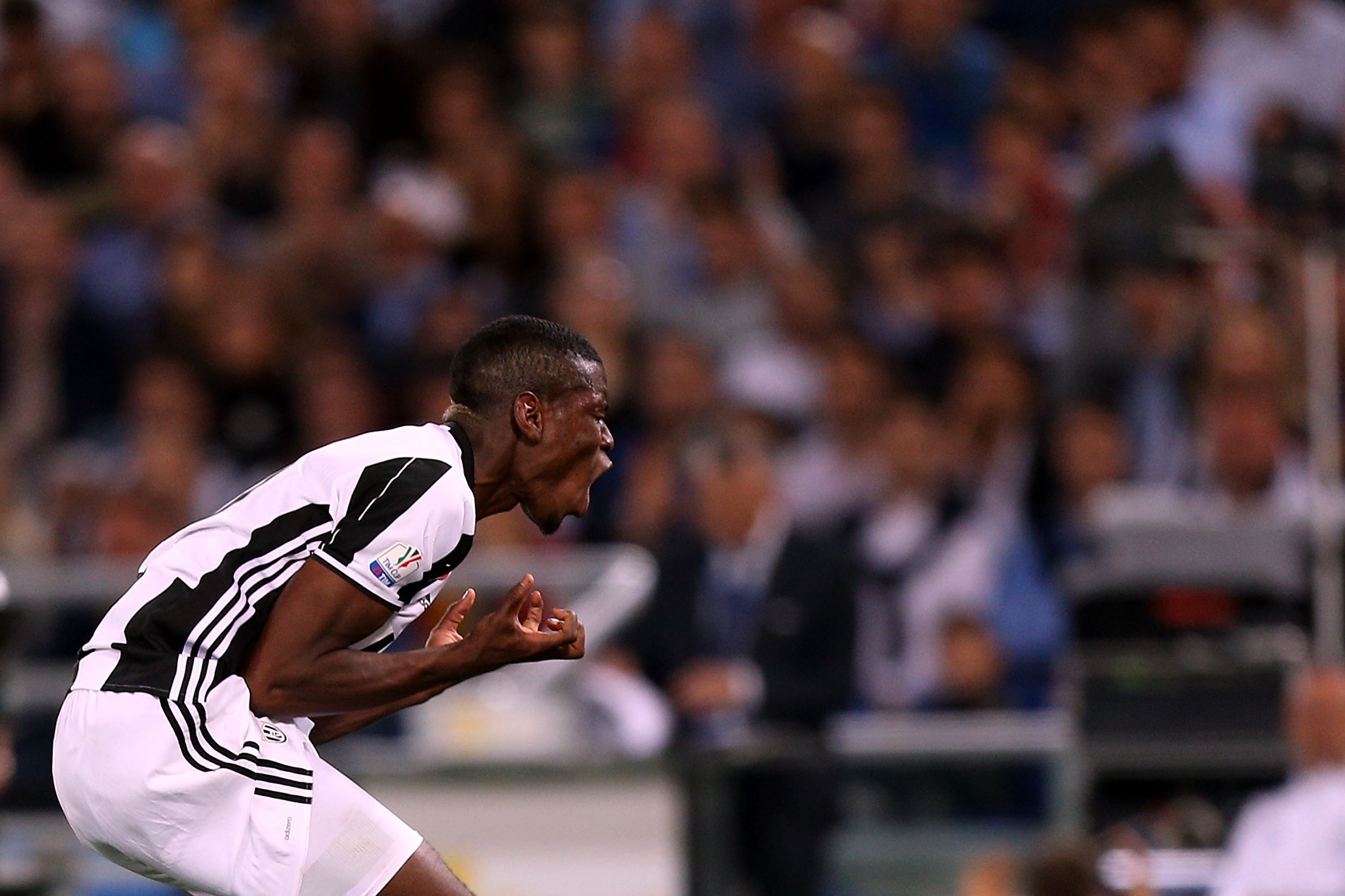 ROME, ITALY - MAY 21: Paul Pogba of Juventus FC reacts during the TIM Cup match between AC Milan and Juventus FC at Stadio Olimpico on May 21, 2016 in Rome, Italy.  (Photo by Gabriele Maltinti/Getty Images)