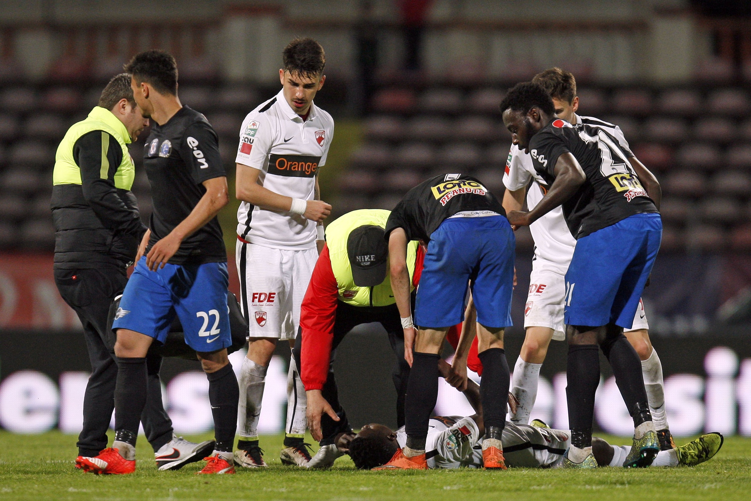 Ekeng lies on the pitch after he collapsed during the football match between Dinamo Bucharest and Viitorul Constanta in Bucharest May 6, 2016.