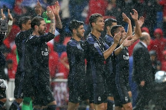 MADRID, SPAIN - MAY 10: Sergio Ramos, Cristiano Ronaldo and teammates of Real Madrid celebrate the victory following the UEFA Champions League Semi Final second leg match between Club Atletico de Madrid and Real Madrid CF at Vicente Calderon Stadium on Ma
