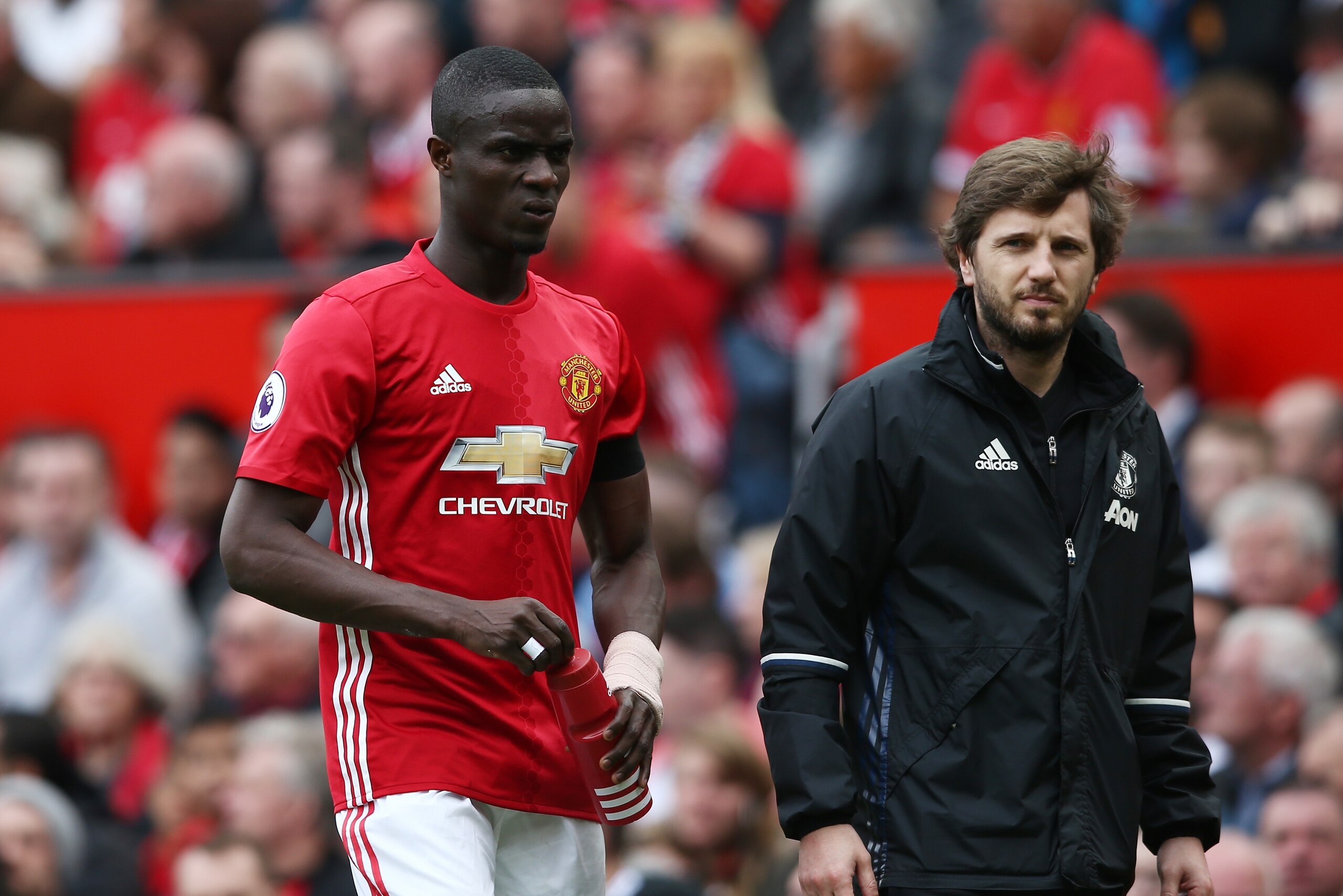 MANCHESTER, ENGLAND - APRIL 30:  Eric Bailly of Manchester United looks dejected as he is forced off injured during the Premier League match between Manchester United and Swansea City at Old Trafford on April 30, 2017 in Manchester, England.  (Photo by Ja