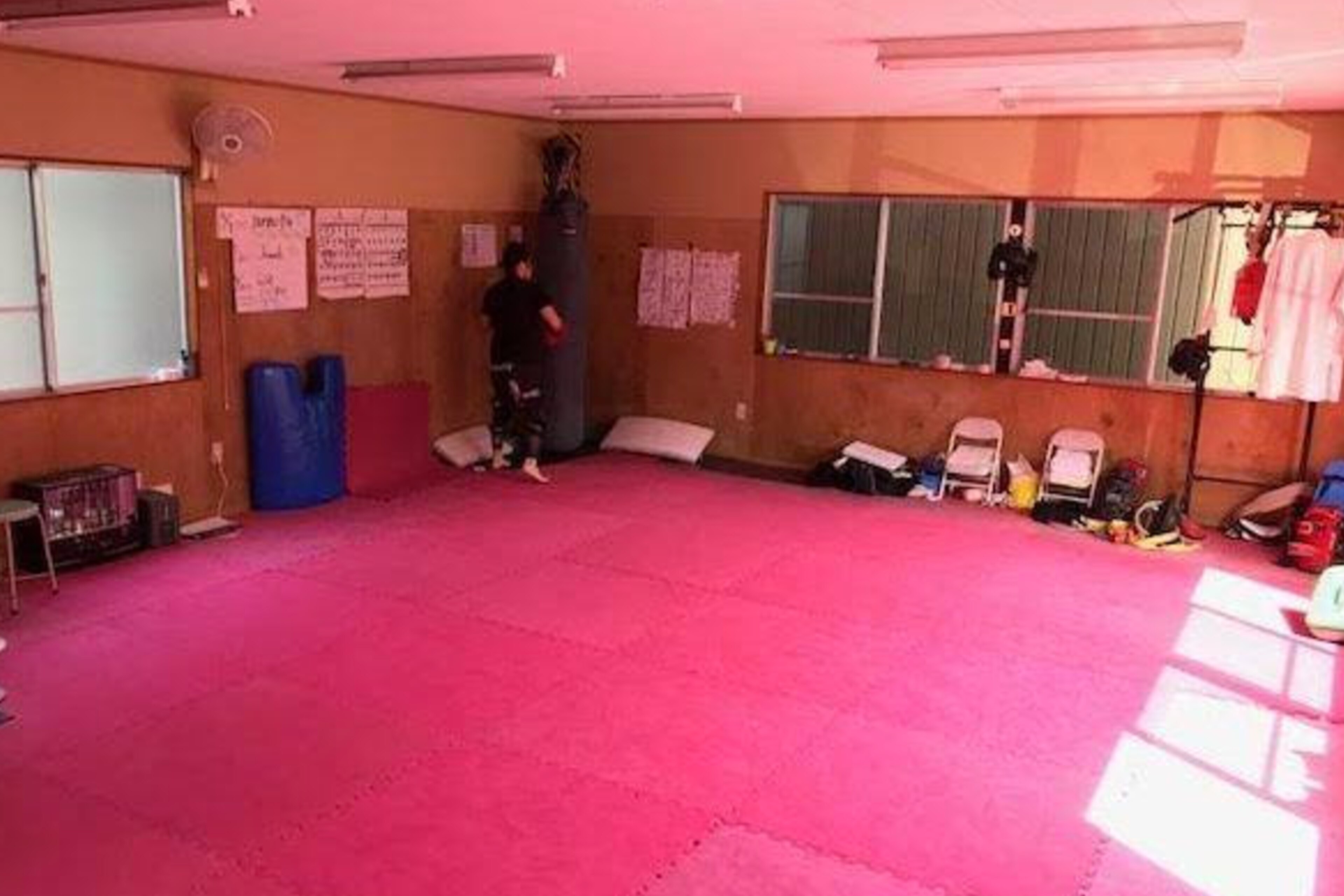 The modest gym in which Momo trains is only 600 square feet, but it has developed three successful pro fighters.
