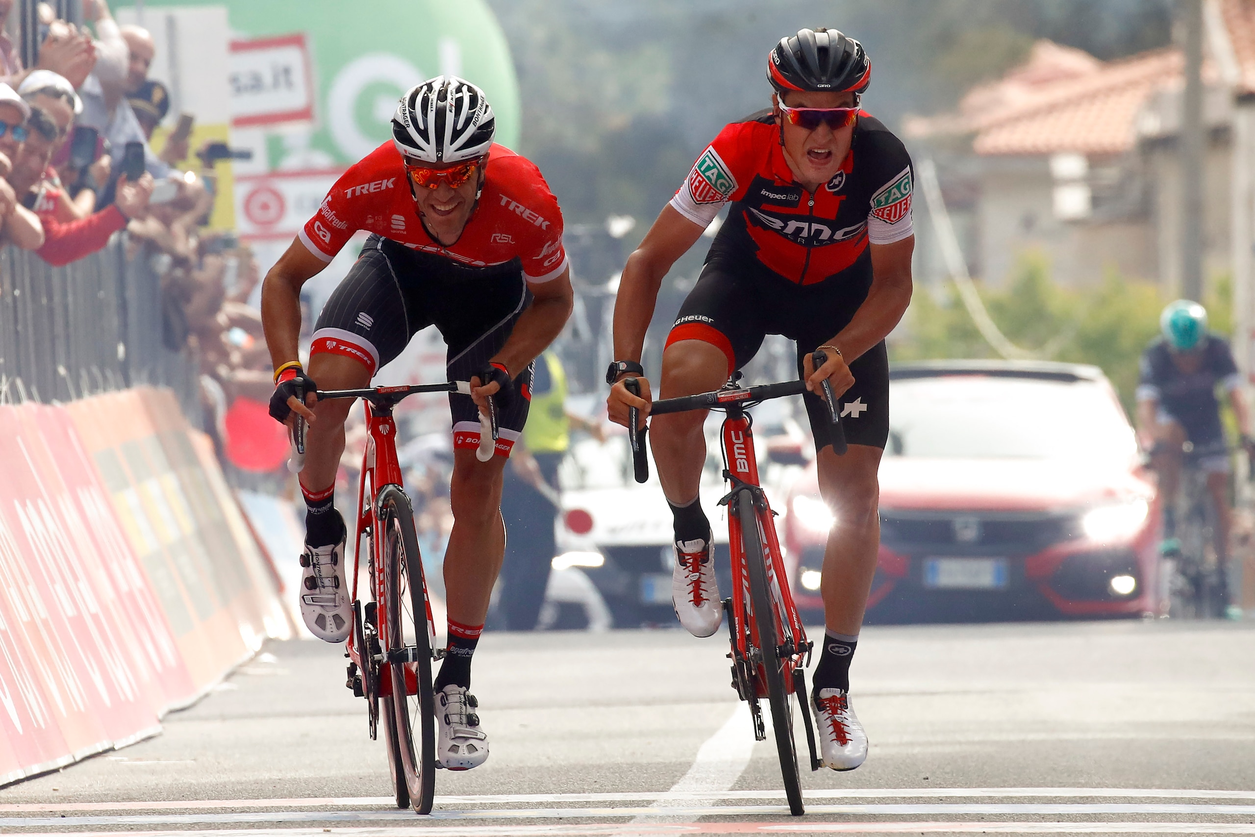 Swiss BMC rider Silvan Dillier (R) celebrates as he crosses the finish line ahead Belgian rival Jasper Stuyven of team Trek to win the 6th stage of the 100th Giro d'Italia, Tour of Italy, cycling race from Reggio di Calabria to Terme Luigiane on May 11, 2 Swiss BMC rider Silvan Dillier (R) celebrates as he crosses the finish line ahead Belgian rival Jasper Stuyven of team Trek to win the 6th stage of the 100th Giro d'Italia, Tour of Italy, cycling race from Reggio di Calabria to Terme Luigiane on May 11, 2