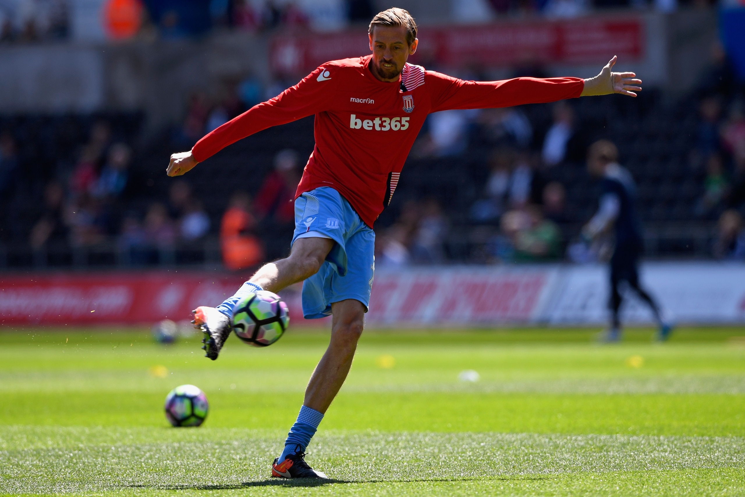 SWANSEA, WALES - APRIL 22: Peter Crouch of Stoke City warms up prior to the Premier League match between Swansea City and Stoke City at the Liberty Stadium on April 22, 2017 in Swansea, Wales.  (Photo by Stu Forster/Getty Images)
