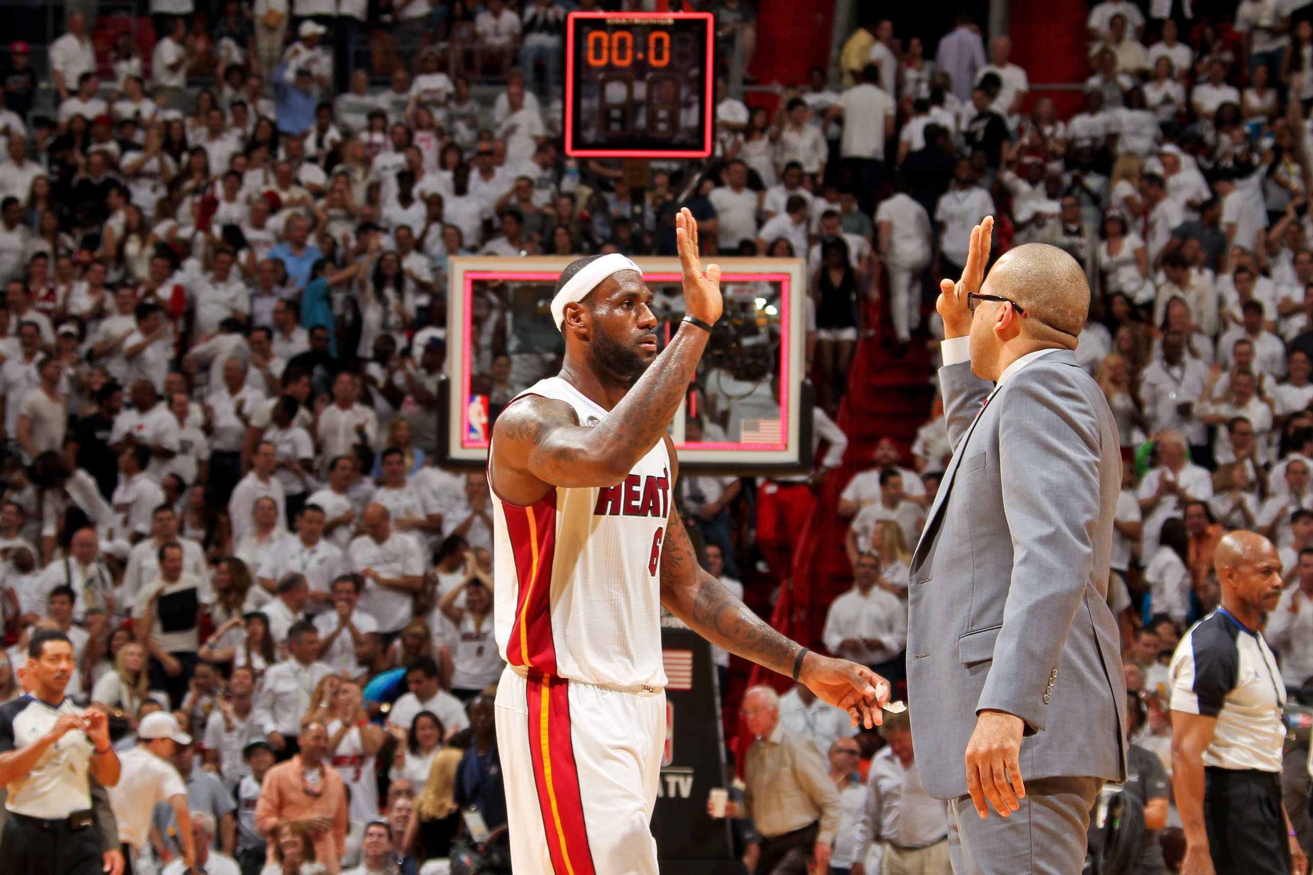 MIAMI, FL - MAY 24: LeBron James #6 of the Miami Heat celebrates with assistant coach David Fizdale while playing the Indiana Pacers in Game Two of the Eastern Conference Finals during the 2013 NBA Playoffs on May 24, 2013 at American Airlines Arena in Mi