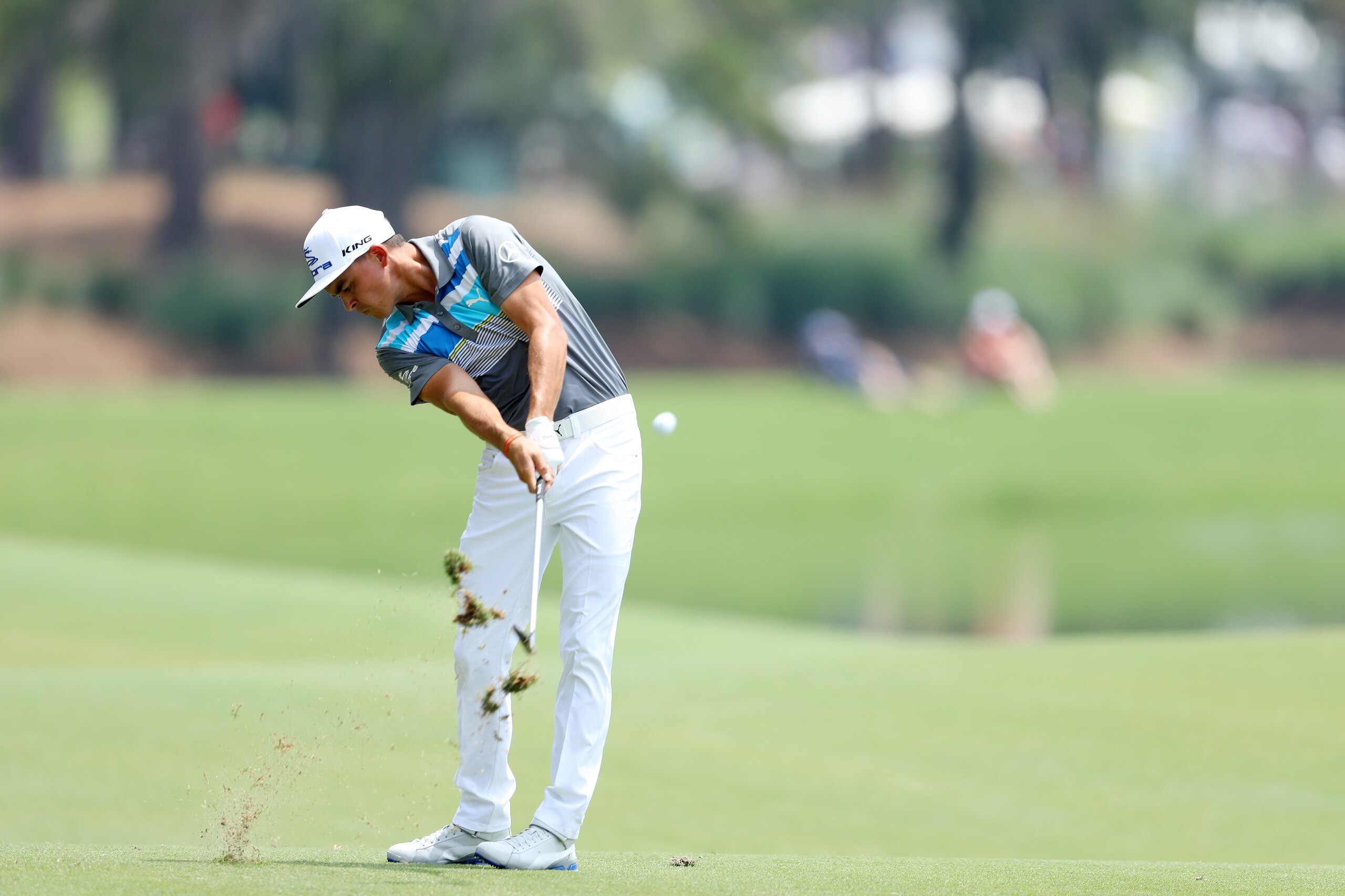 PONTE VEDRA BEACH, FL - MAY 11:  Rickie Fowler of the United States plays a shot on the sixth hole during the first round of the THE PLAYERS Championship at the Stadium course at TPC Sawgrass on May 11, 2017 in Ponte Vedra Beach, Florida.  (Photo by Warre