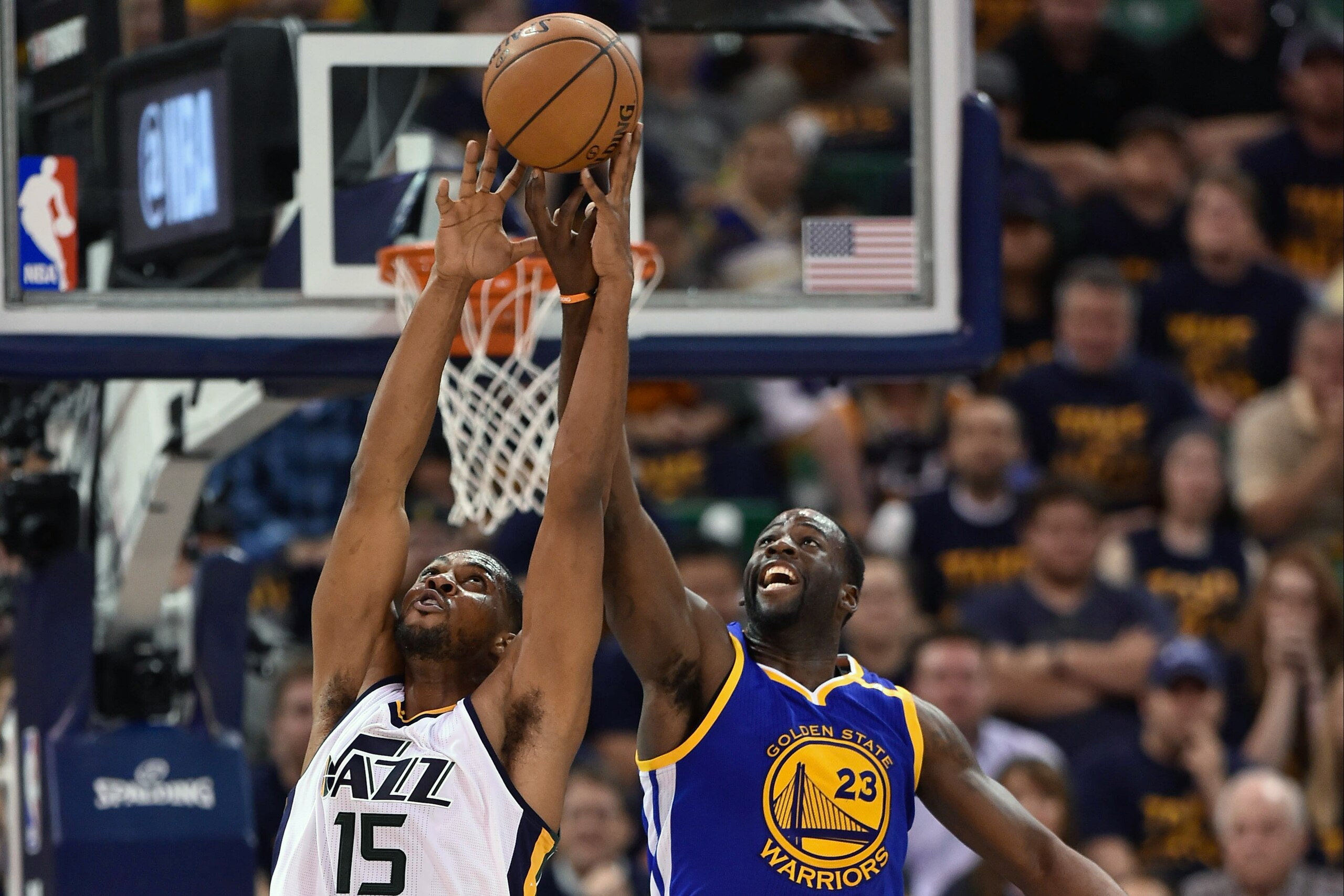 SALT LAKE CITY, UT - MAY 8: Derrick Favors #15 of the Utah Jazz and Draymond Green #23 of the Golden State Warriors try for the rebound in the second half of the Warriors 121-95 win in Game Four of the Western Conference Semifinals during the 2017 NBA Pla