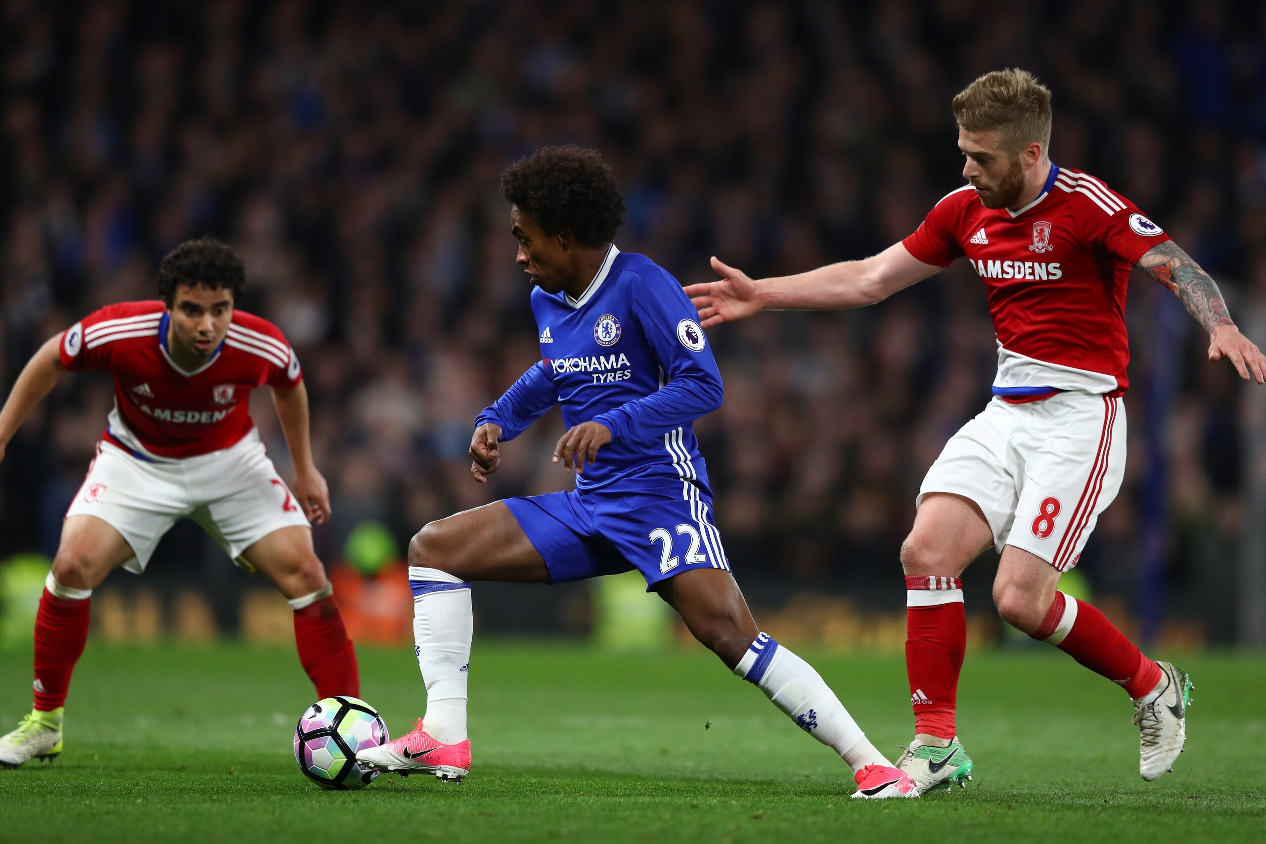 LONDON, ENGLAND - MAY 08:  Adam Clayton of Middlesbrough closes down Willian of Chelsea during the Premier League match between Chelsea and Middlesbrough at Stamford Bridge on May 8, 2017 in London, England.  (Photo by Michael Steele/Getty Images)