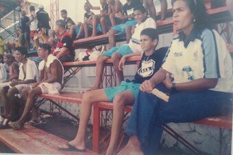 A young Costa watches a game alongside his aunt