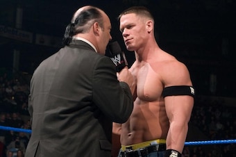 Heyman with John Cena.