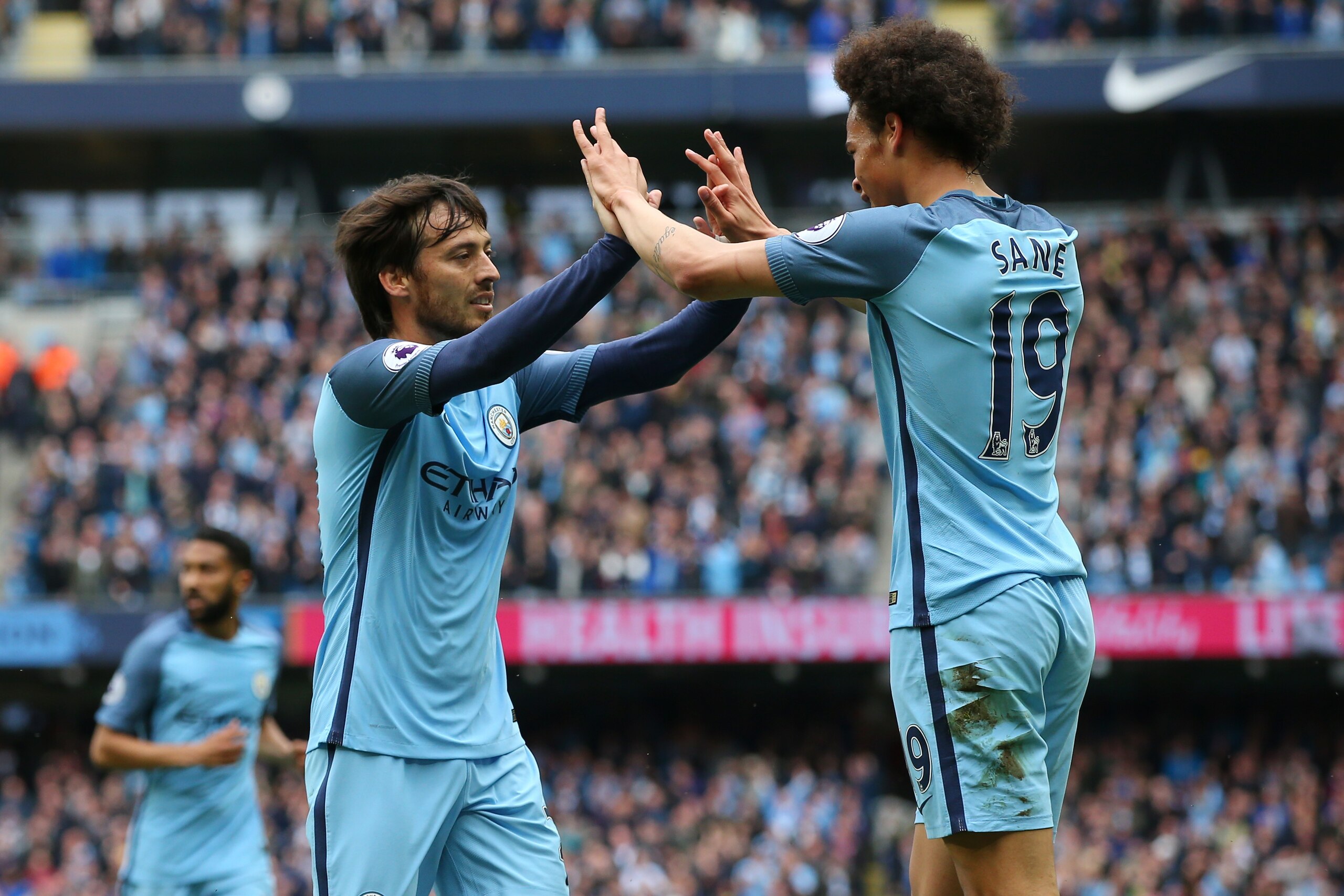 MANCHESTER, ENGLAND - MAY 13: David Silva of Manchester City celebrates scoring his sides first goal with Leroy Sane of Manchester City during the Premier League match between Manchester City and Leicester City at Etihad Stadium on May 13, 2017 in Manche MANCHESTER, ENGLAND - MAY 13: David Silva of Manchester City celebrates scoring his sides first goal with Leroy Sane of Manchester City during the Premier League match between Manchester City and Leicester City at Etihad Stadium on May 13, 2017 in Manche