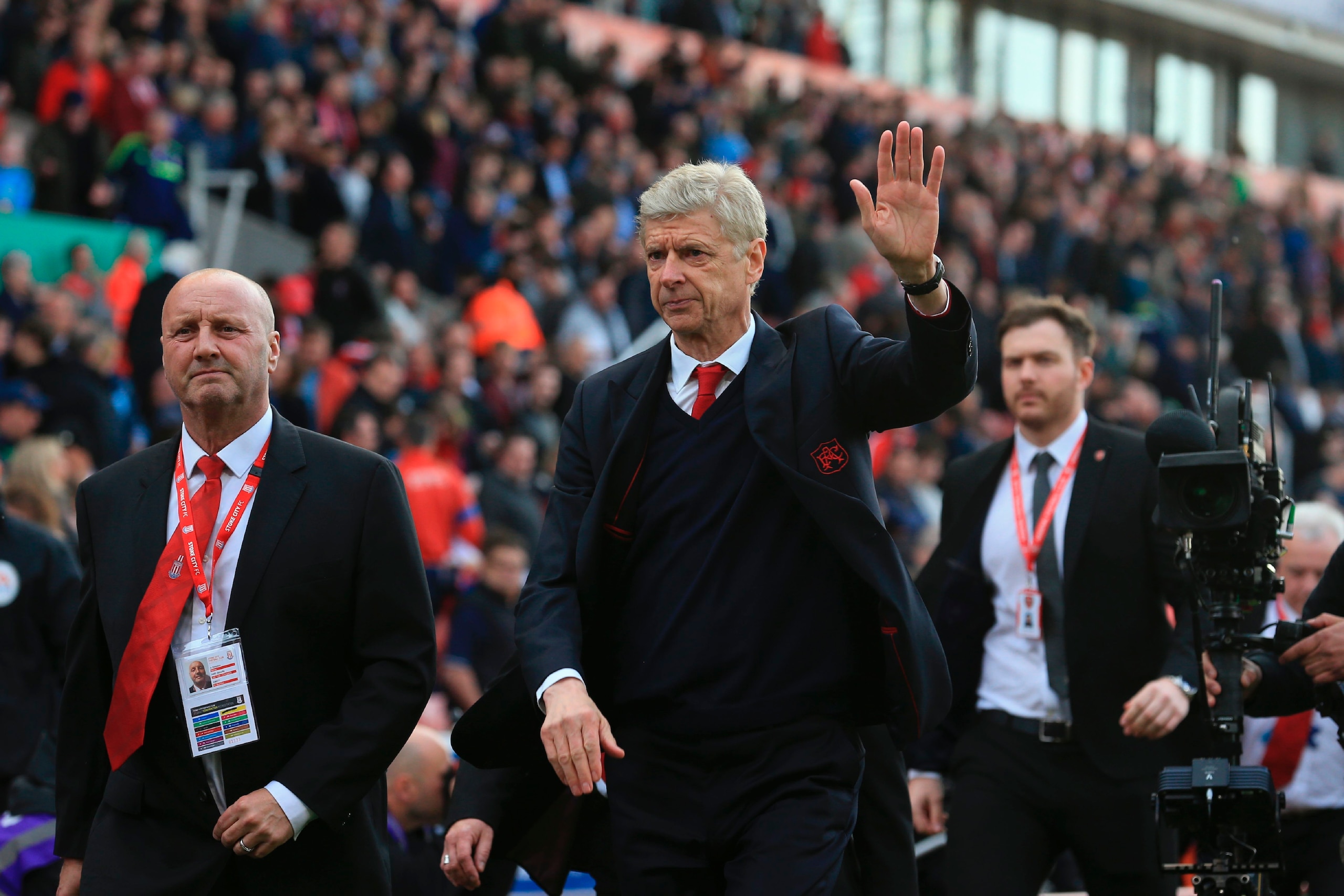 Arsenal's French manager Arsene Wenger (C) gestures as he leaves after the English Premier League football match between Stoke City and Arsenal at the Bet365 Stadium in Stoke-on-Trent, central England on May 13, 2017.
Arsenal won the game 4-1. / AFP PHOTO