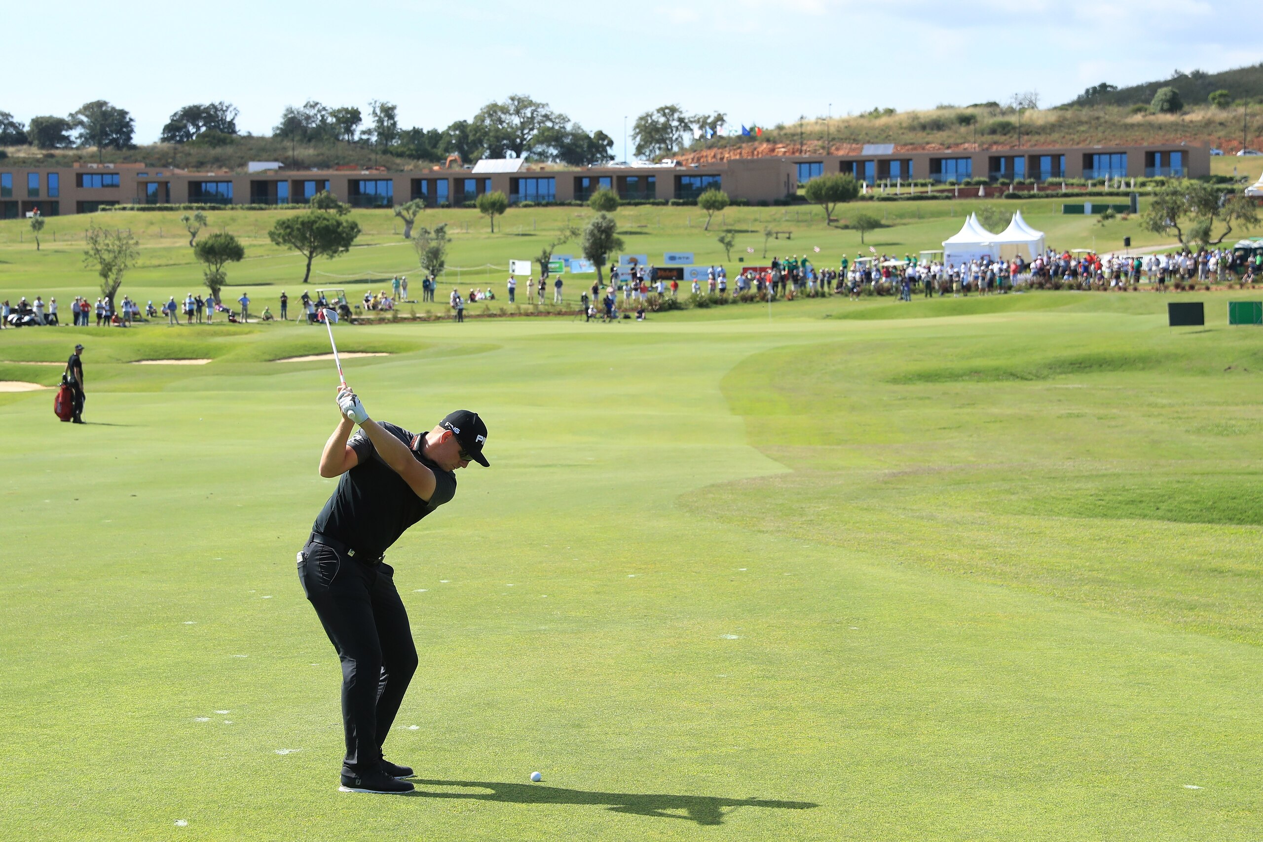 PORTIMAO, PORTUGAL - MAY 14:  Matt Wallace of England plays his second shot on the 18th hole during the final round on day four of the Open de Portugal at Morgado Golf Resort on May 14, 2017 in Portimao, Portugal.  (Photo by Andrew Redington/Getty Images)