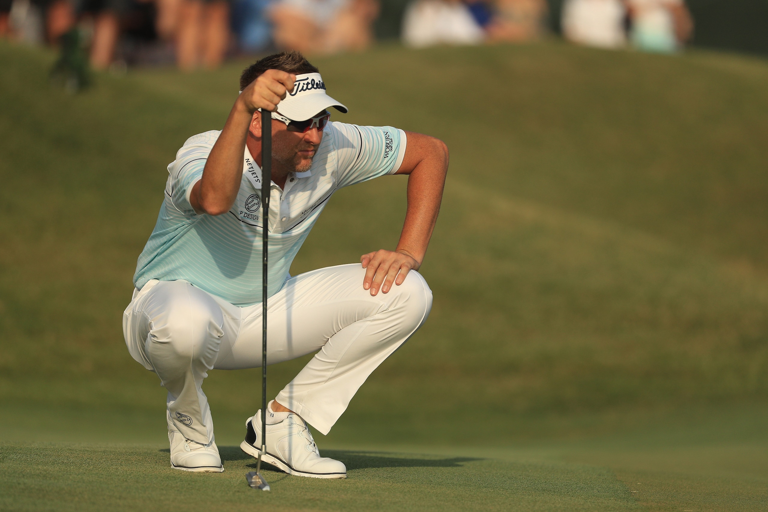 PONTE VEDRA BEACH, FL - MAY 13: Ian Poulter of England lines up a putt on the 18th green during the third round of THE PLAYERS Championship at the Stadium course at TPC Sawgrass on May 13, 2017 in Ponte Vedra Beach, Florida. (Photo by Mike Ehrmann/Getty PONTE VEDRA BEACH, FL - MAY 13: Ian Poulter of England lines up a putt on the 18th green during the third round of THE PLAYERS Championship at the Stadium course at TPC Sawgrass on May 13, 2017 in Ponte Vedra Beach, Florida. (Photo by Mike Ehrmann/Getty