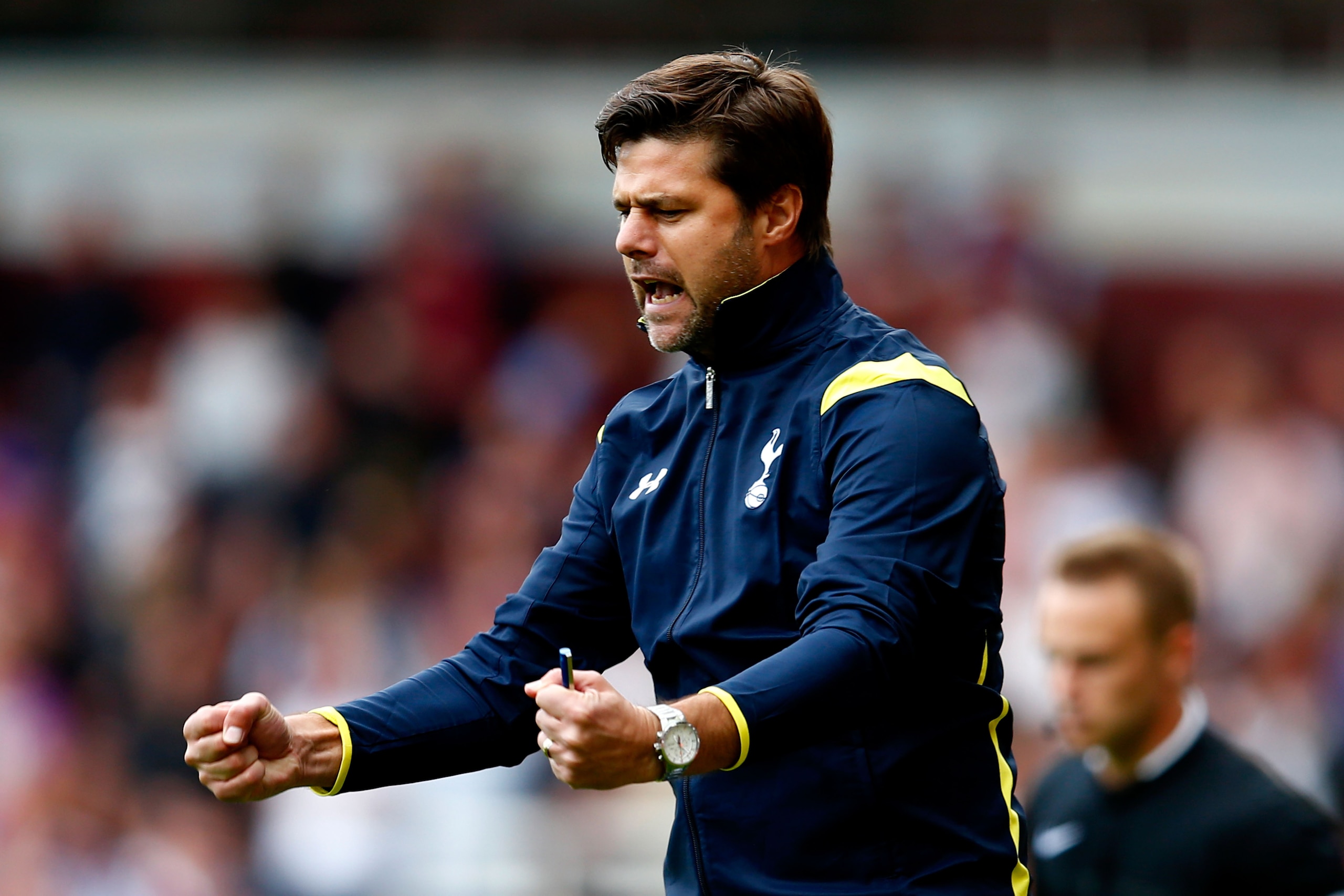LONDON, ENGLAND - AUGUST 16:  Mauricio Pochettino the Spurs manager celebrates his team's goal during the Barclays Premier League match between West Ham United and Tottenham Hotspur at Boleyn Ground on August 16, 2014 in London, England.  (Photo by Julian