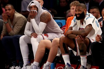NEW YORK, NY - APRIL 12:  Carmelo Anthony #7 of the New York Knicks looks on from the bench in the fourth quarter against the Philadelphia 76ers at Madison Square Garden on April 12, 2017 in New York City. NOTE TO USER: User expressly acknowledges and agr