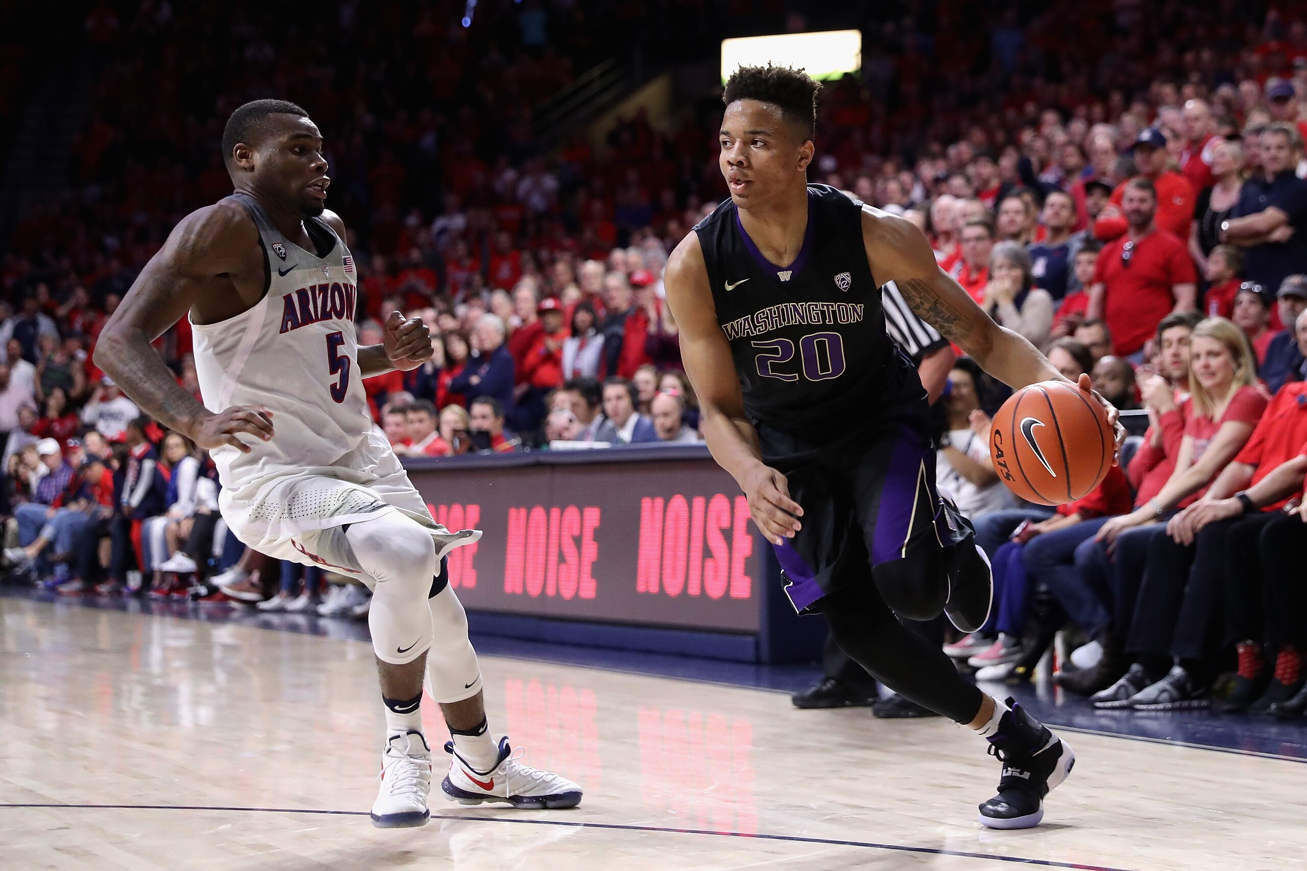 TUCSON, AZ - JANUARY 29:  Markelle Fultz #20 of the Washington Huskies handles the ball against Kadeem Allen #5 of the Arizona Wildcats during the second half of the college basketball game at McKale Center on January 29, 2017 in Tucson, Arizona. The Wild