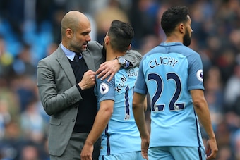 MANCHESTER, ENGLAND - MAY 13:  Josep Guardiola, Manager of Manchester City and Sergio Aguero of Manchester City embrace after the Premier League match between Manchester City and Leicester City at Etihad Stadium on May 13, 2017 in Manchester, England.  (P