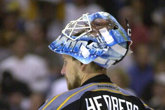 10 May 2001: Johan Hedberg of the Pittsburgh Penguins rests while observing the play during game 7 of the Eastern Conference Semi Finals of the Stanley Cup Playoffs against the Buffalo Sabres at the HSBC Arena in Buffalo, New York. The Penguins defeat the