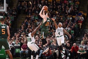 BOSTON, MA - JANUARY 3:  Gordon Hayward #20 of the Utah Jazz shoots the ball against Isaiah Thomas #4 and Jae Crowder #99 of the Boston Celtics during the game on January 3, 2017 at the TD Garden in Boston, Massachusetts.  NOTE TO USER: User expressly ack